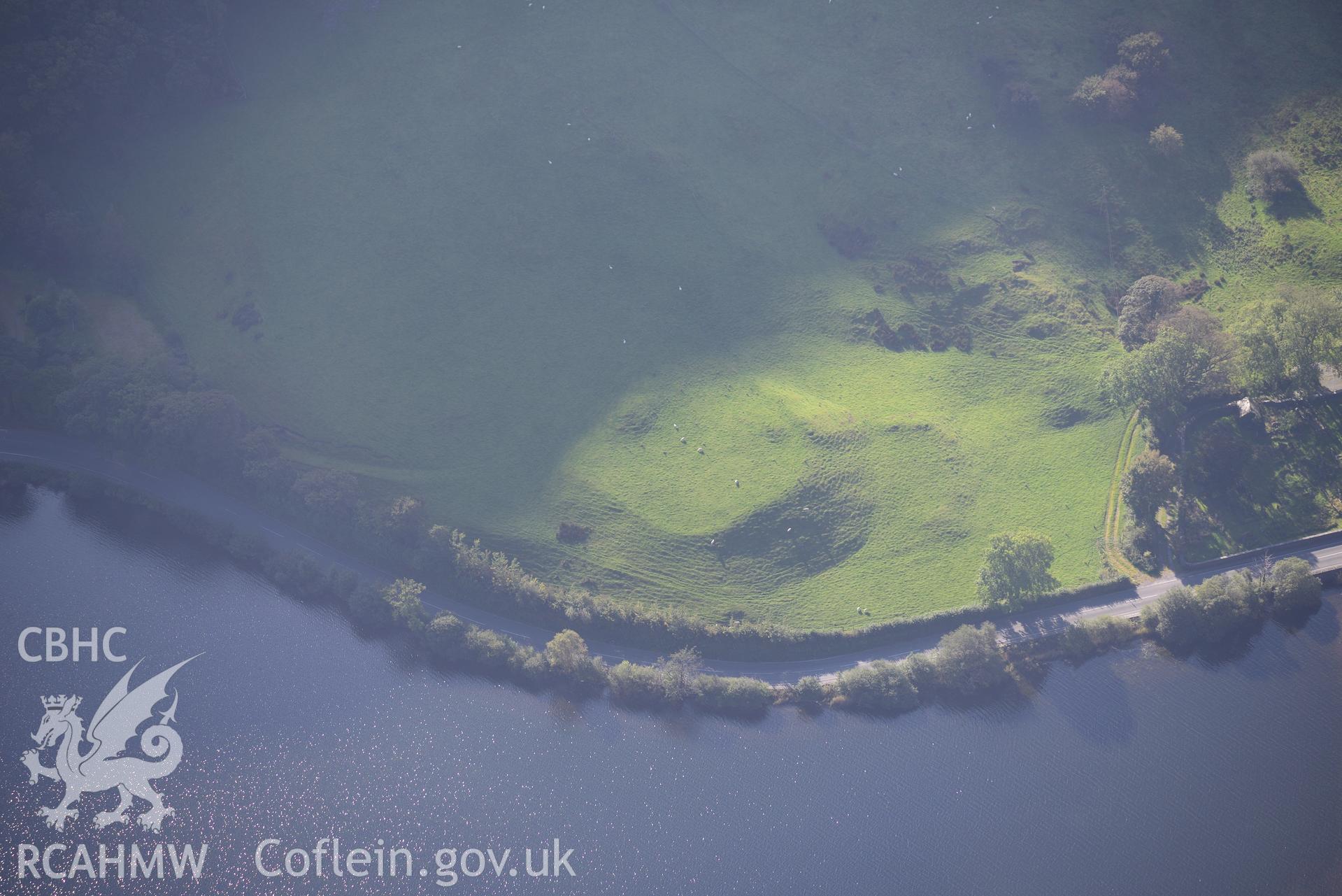 Tal-y-Llyn enclosure or Roman fortlet, on the banks of Tal-y-Llyn lake, near Corris. Oblique aerial photograph taken during the Royal Commission's programme of archaeological aerial reconnaissance by Toby Driver on 2nd October 2015.