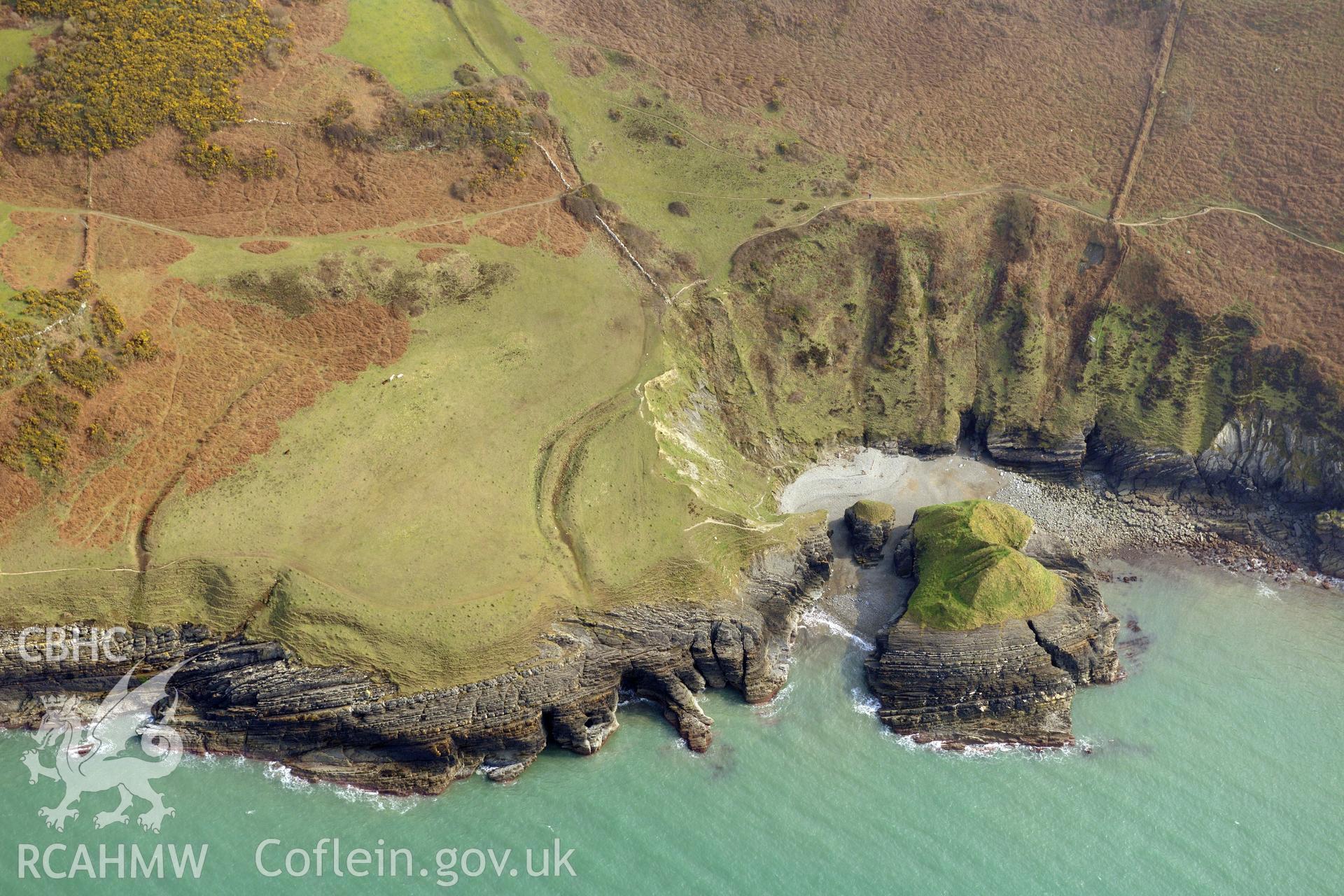 Aerial photography of Castell Bach taken on 27th March 2017 to monitor coastal erosion. Baseline aerial reconnaissance survey for the CHERISH Project. ? Crown: CHERISH PROJECT 2019. Produced with EU funds through the Ireland Wales Co-operation Programme 2014-2020. All material made freely available through the Open Government Licence.