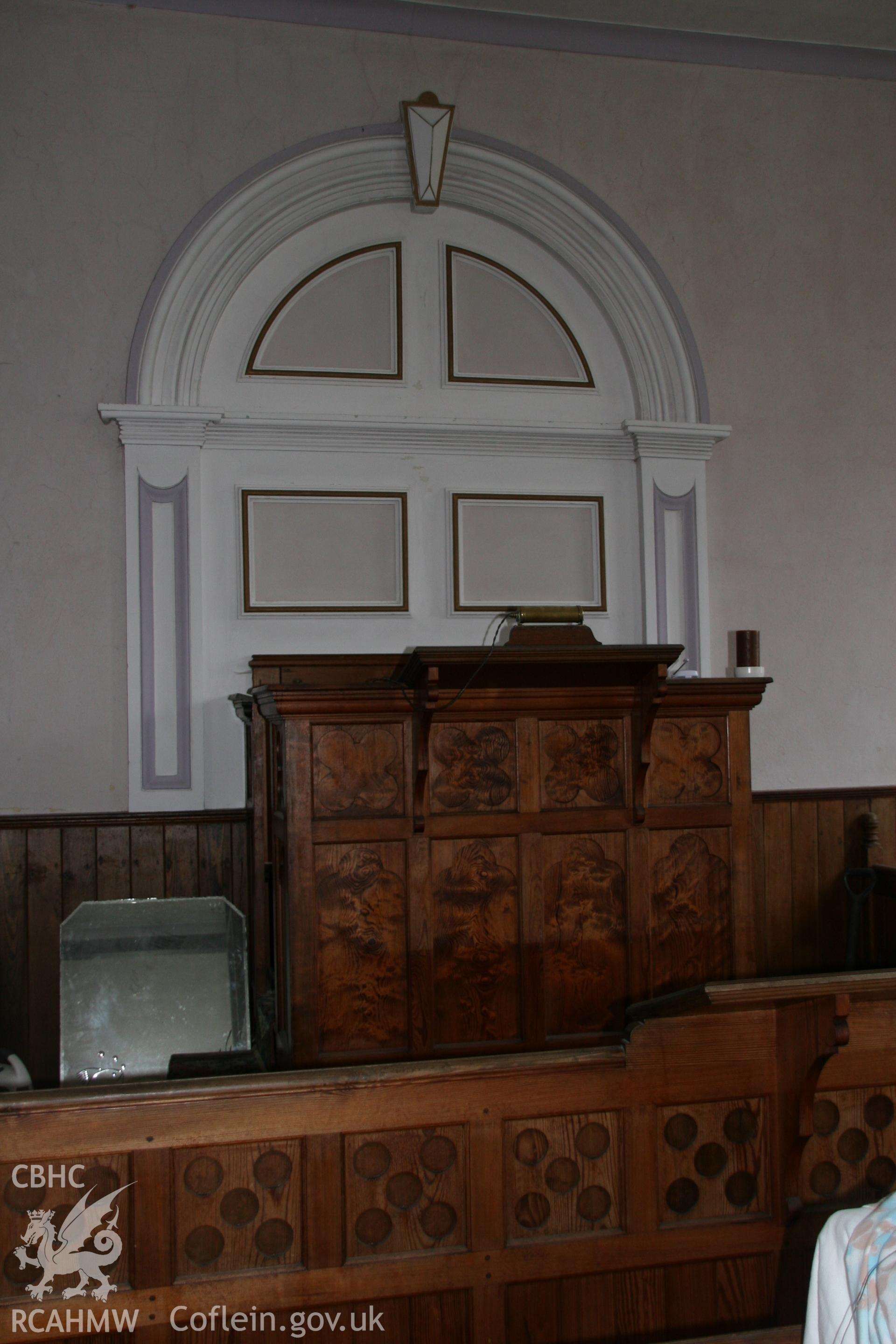 Photograph showing detailed view of the pulpit and rear plaster work at the former Llawrybettws Welsh Calvinistic Methodist chapel, Glanyrafon, Corwen. Produced by Tim Allen on 7th March 2019 to meet a condition attached to planning application.