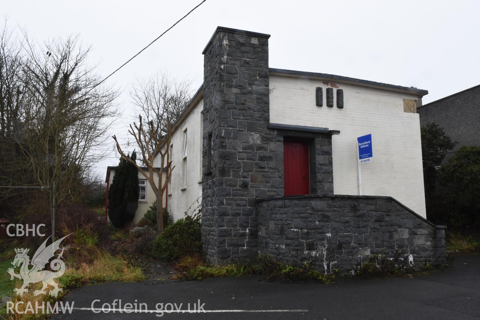 Exterior view of side elevation and entrance to the Catholic Church of the Holy Spirit, Criccieth. Photographed during survey conducted by Sue Fielding for the RCAHMW, 21st January 2019.