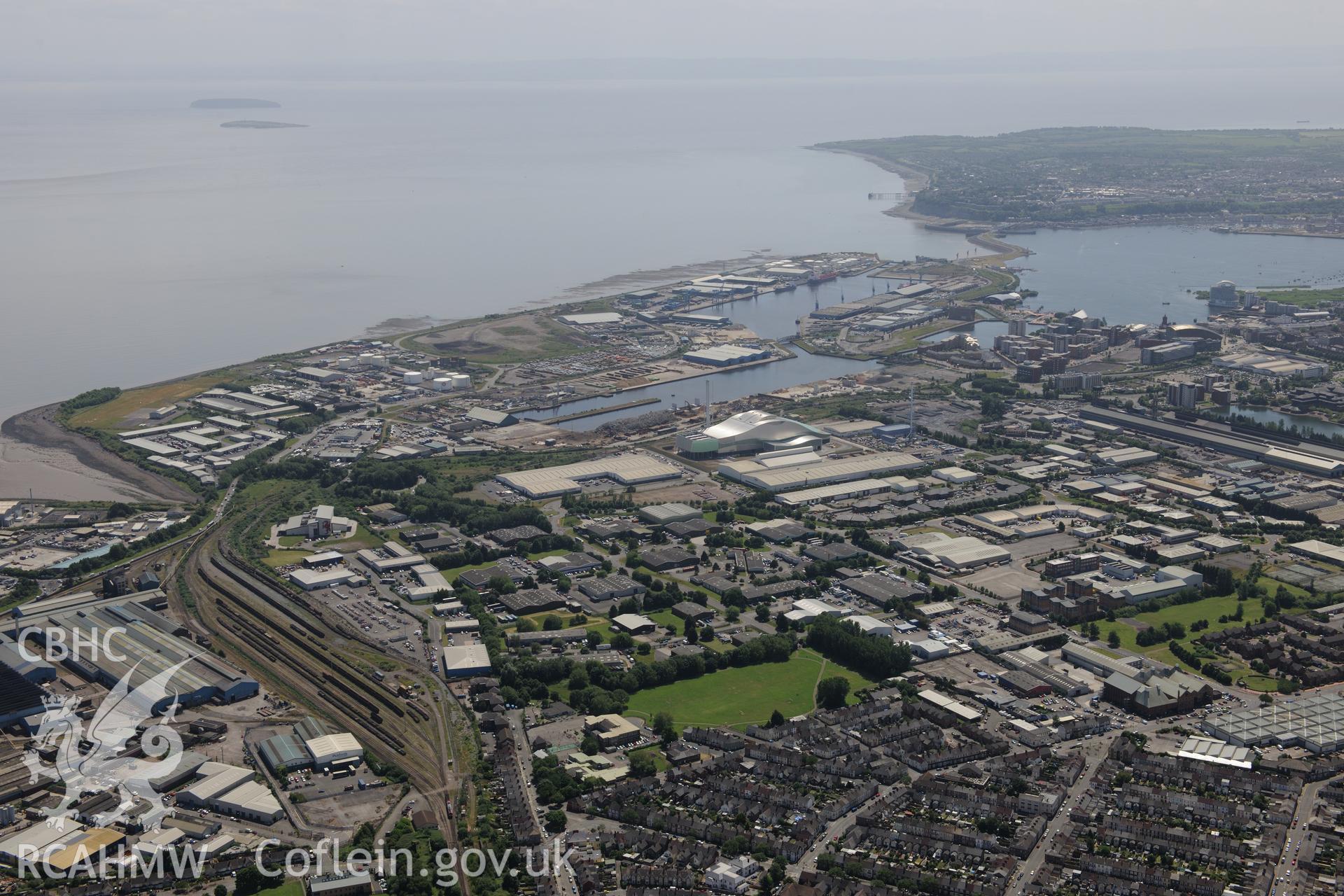 Roath Docks and Queen Alexandra Dock at Cardiff Docks, Cardiff Bay. Oblique aerial photograph taken during the Royal Commission's programme of archaeological aerial reconnaissance by Toby Driver on 29th June 2015.