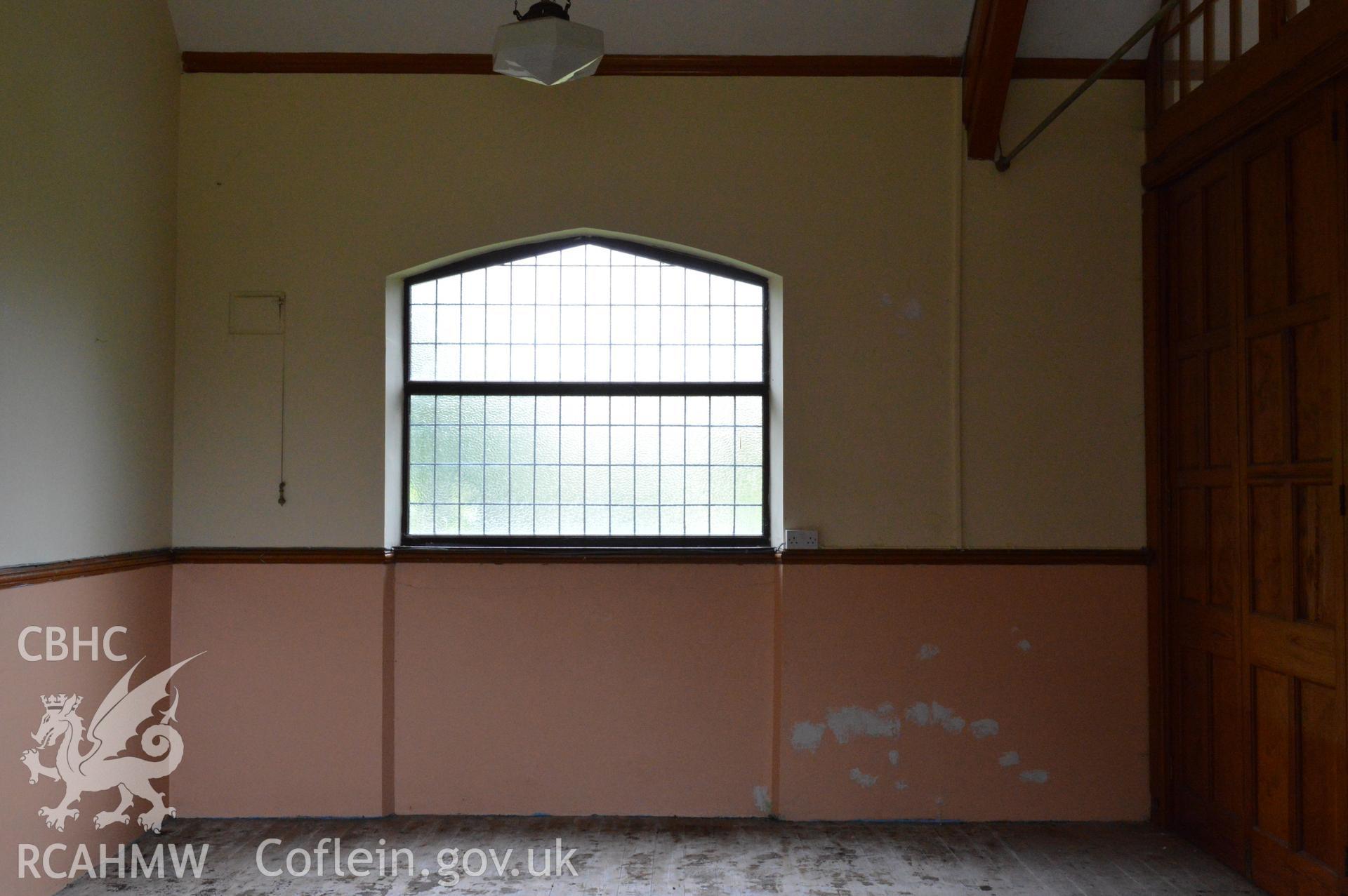 Internal view of the south elevation in the eastern room. Digital colour photograph taken during CPAT Project 2396 at the United Reformed Church in Northop. Prepared by Clwyd Powys Archaeological Trust, 2018-2019.