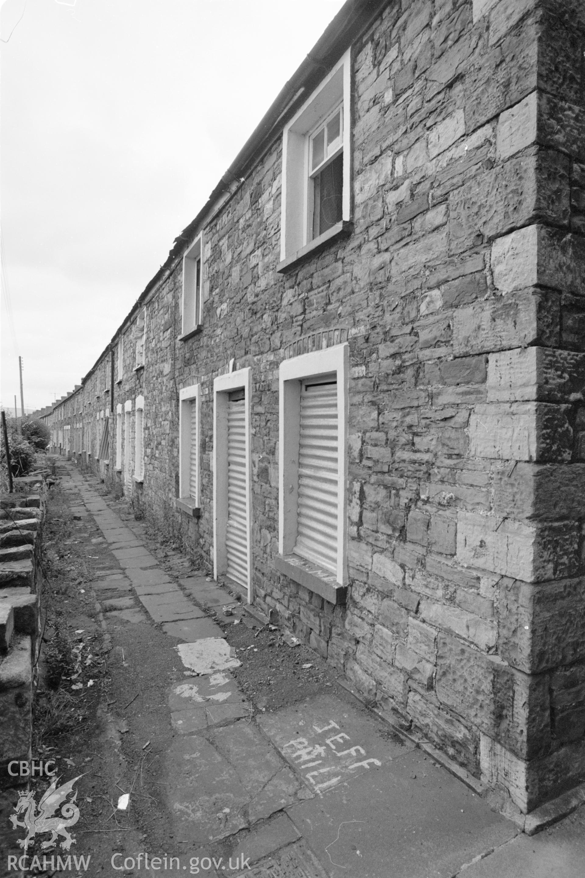 Digital copy of a view looking south showing 22-23 Cyfarthfa Row, Merthyr Tydfil. taken by RCAHMW, c1981.
