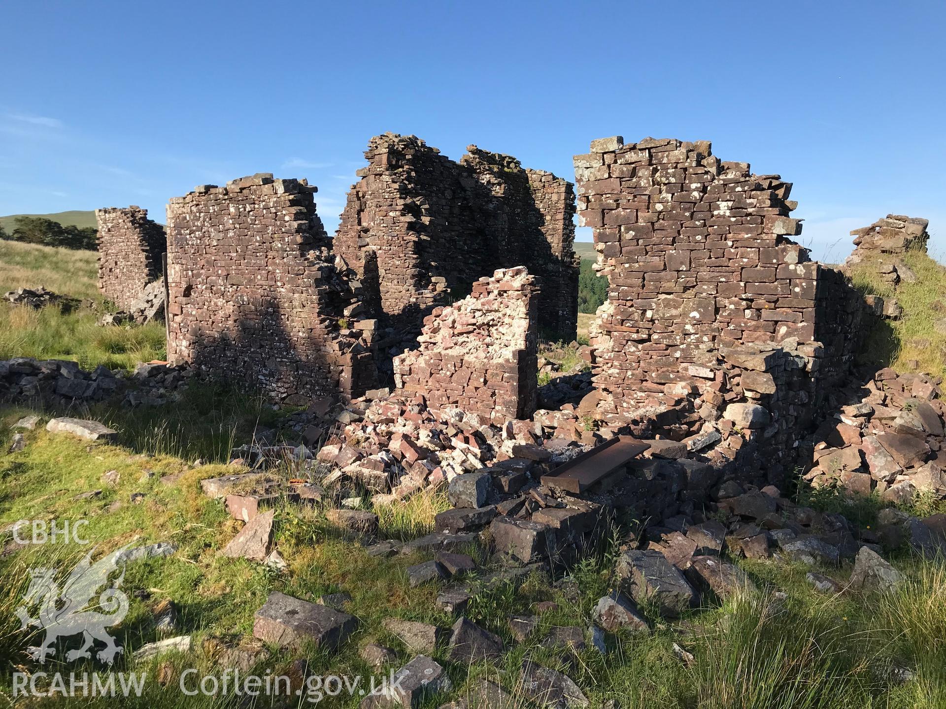 Colour photo showing ruined remains of Plas-y-Gors farmstead, Ystradfellte, taken by Paul R. Davis, 6th June 2018.