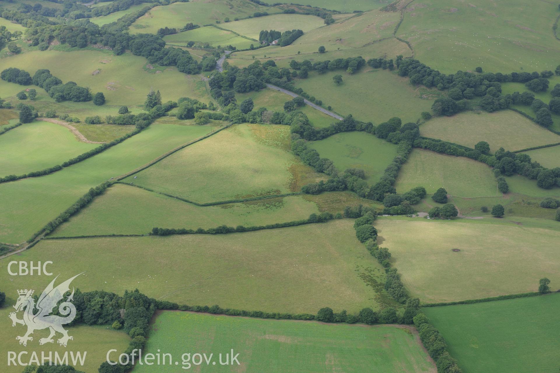 Pen-Rhiw-Dalar Roman Road, north west of Builth Wells. Oblique aerial photograph taken during the Royal Commission?s programme of archaeological aerial reconnaissance by Toby Driver on 1st August 2013.