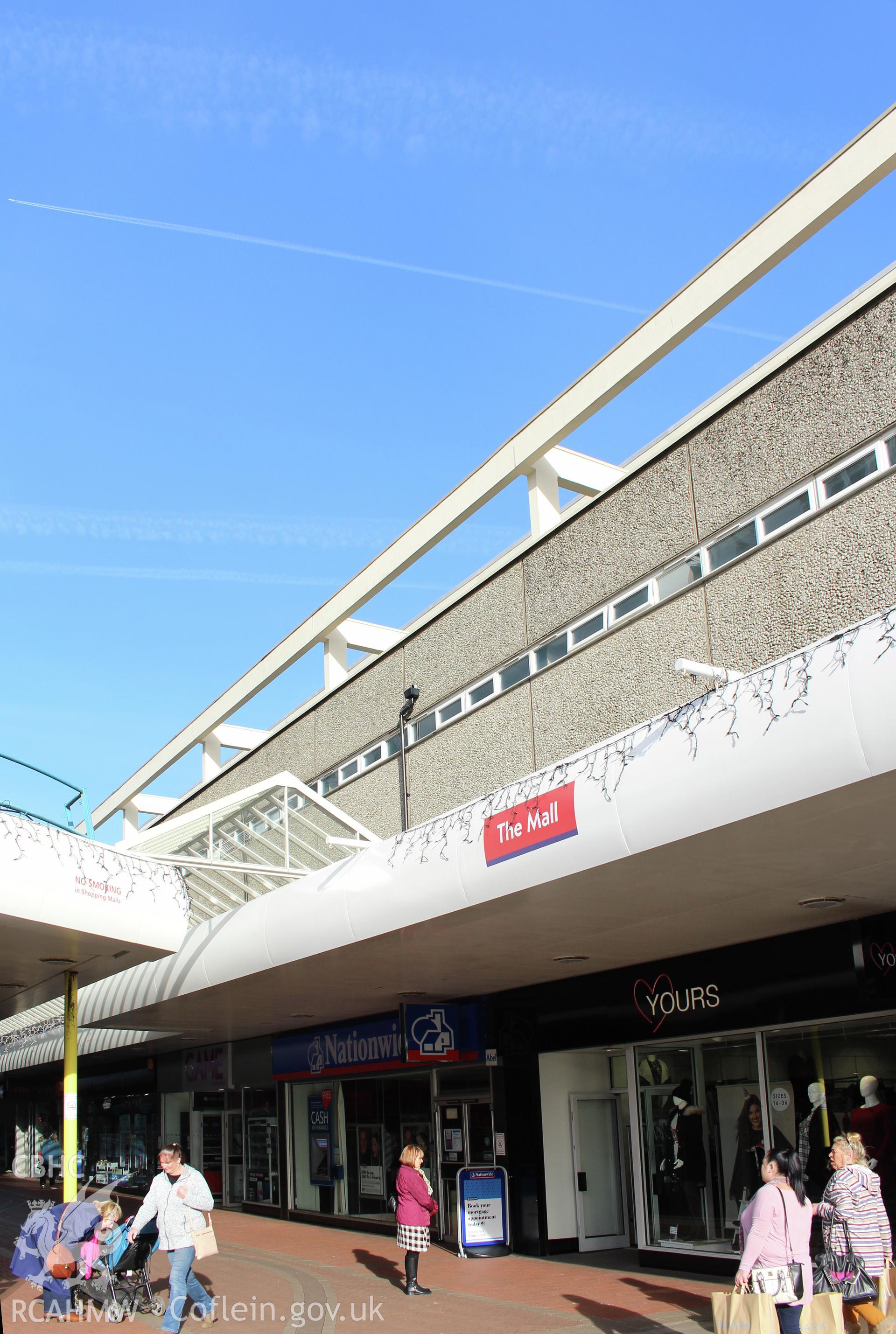Shopfronts at Cwmbran Shopping Centre. Photograph taken by Sue Fielding in November 2017.