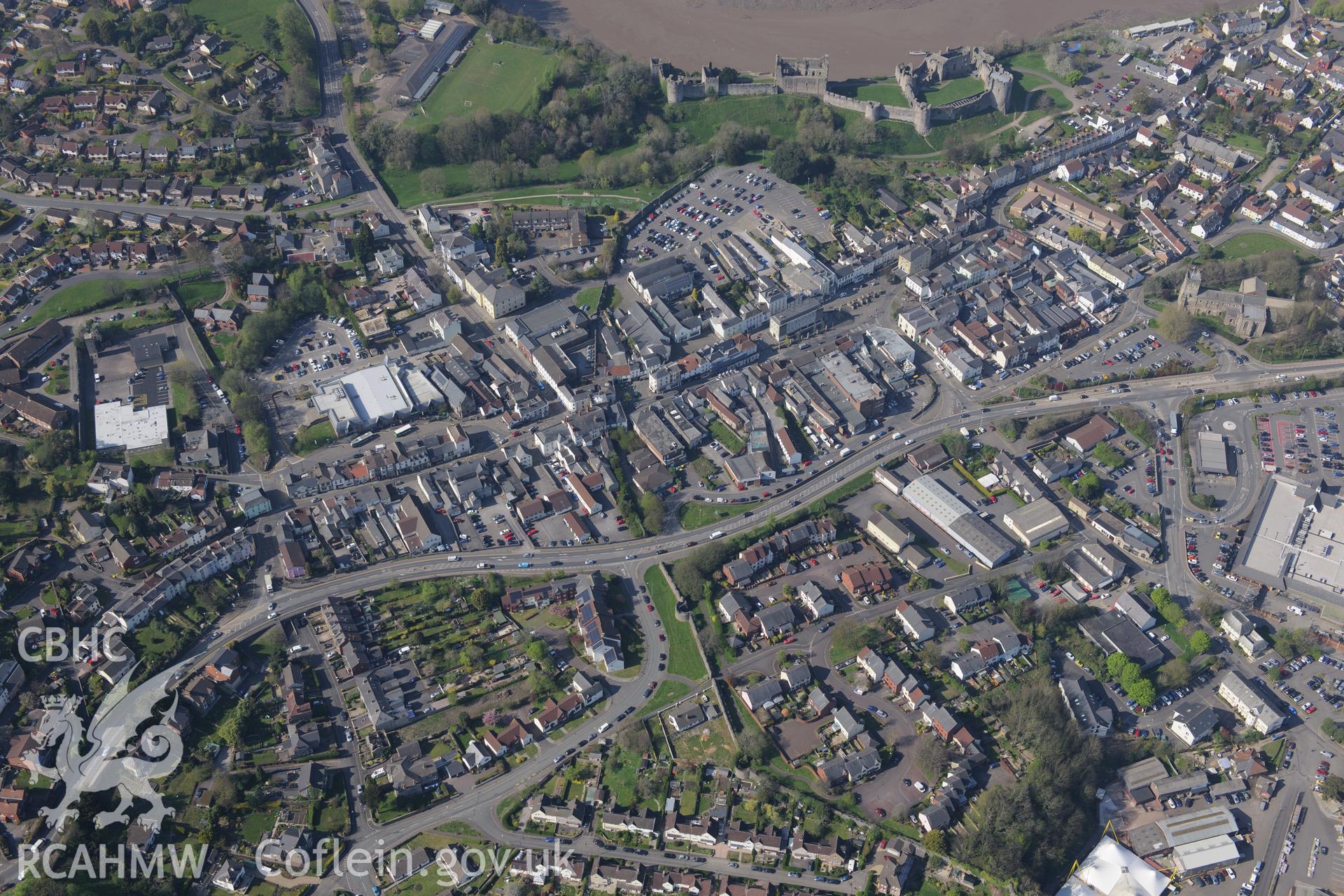Chepstow including views of the Castle, St. Mary's Church, the Old Almshouses and the Palace Theatre. Oblique aerial photograph taken during the Royal Commission's programme of archaeological aerial reconnaissance by Toby Driver on 21st April 2015.