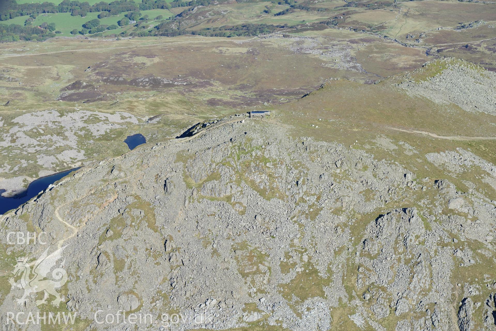 Penygadair - the summit of Cadair Idris. Oblique aerial photograph taken during the Royal Commission's programme of archaeological aerial reconnaissance by Toby Driver on 2nd October 2015.