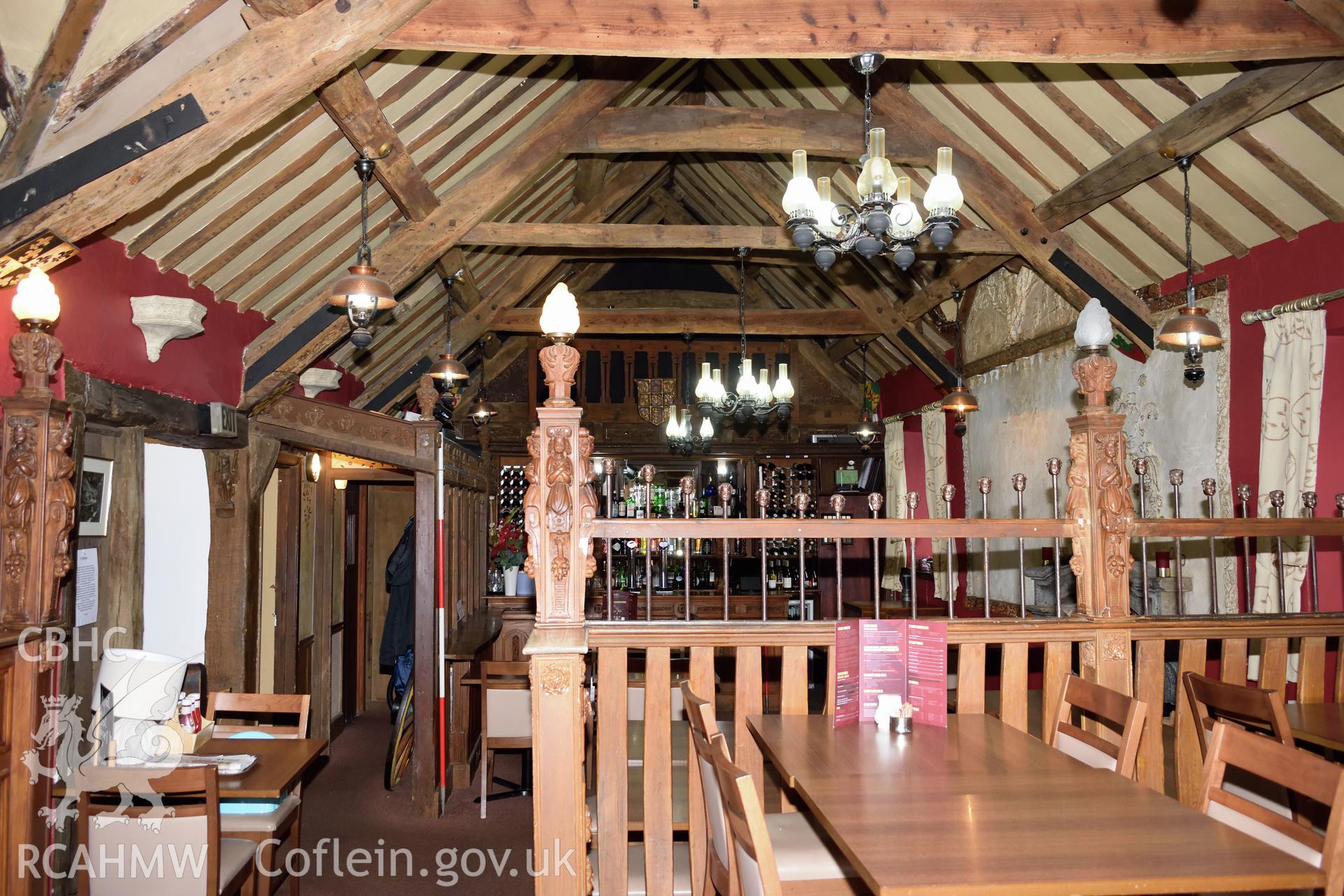 Colour photograph showing view looking west at the first floor restaurant area of Y Sospan, Llys Owain, Dolgellau. Photographed by I. P. Brookes of Engineering Archaeological Services, June 2019.