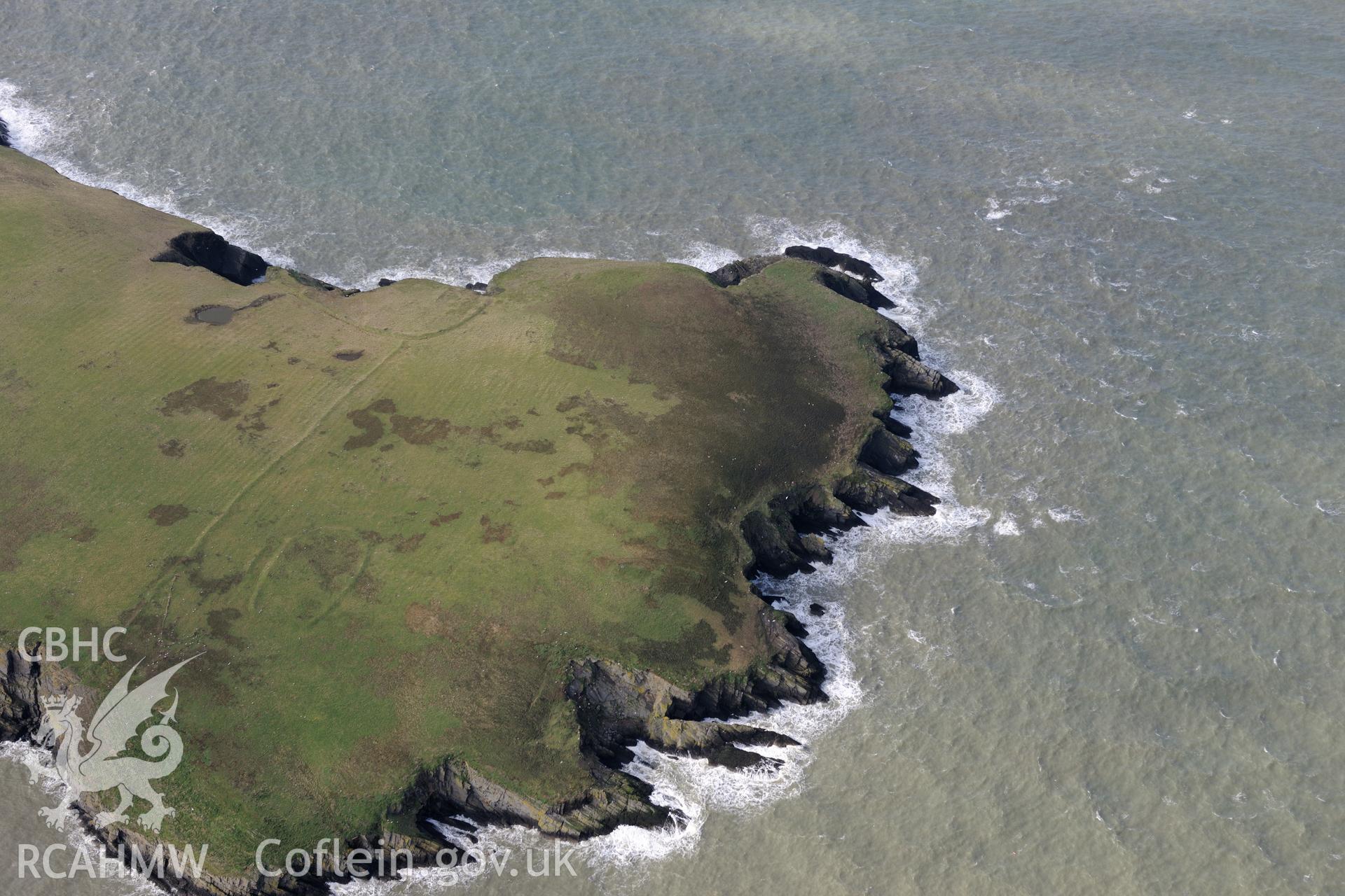 Cardigan Island. From a set of oblique aerial orbital photographs taken for "structure from motion" processing during the Royal Commission's programme of archaeological aerial reconnaissance by Toby Driver on 13th March 2015.