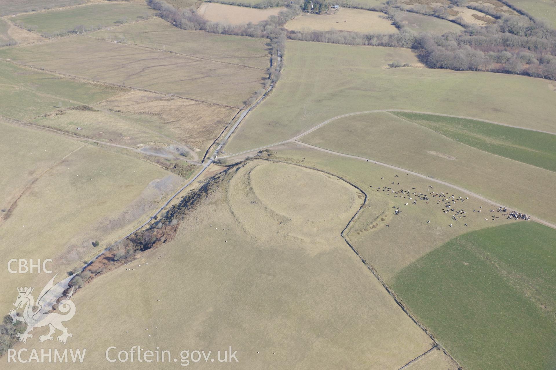 Castell Perthi-Mawr hill fort, Cilcennin, south east of Aberaeron. Oblique aerial photograph taken during the Royal Commission's programme of archaeological aerial reconnaissance by Toby Driver on 2nd April 2013.