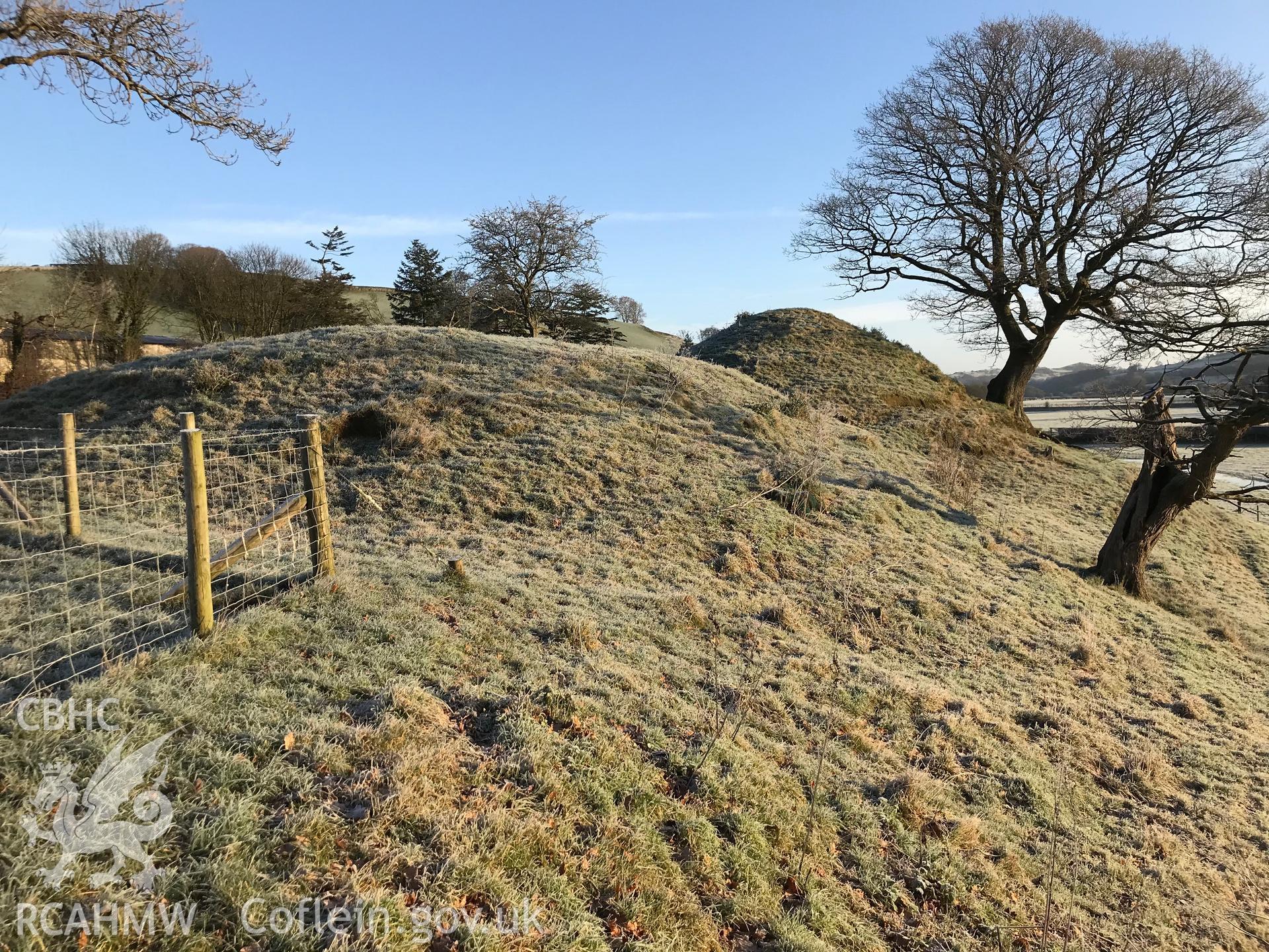 View of Llysun motte and bailey castle, Llanerfyl. Colour photograph taken by Paul R. Davis on 2nd January 2019.