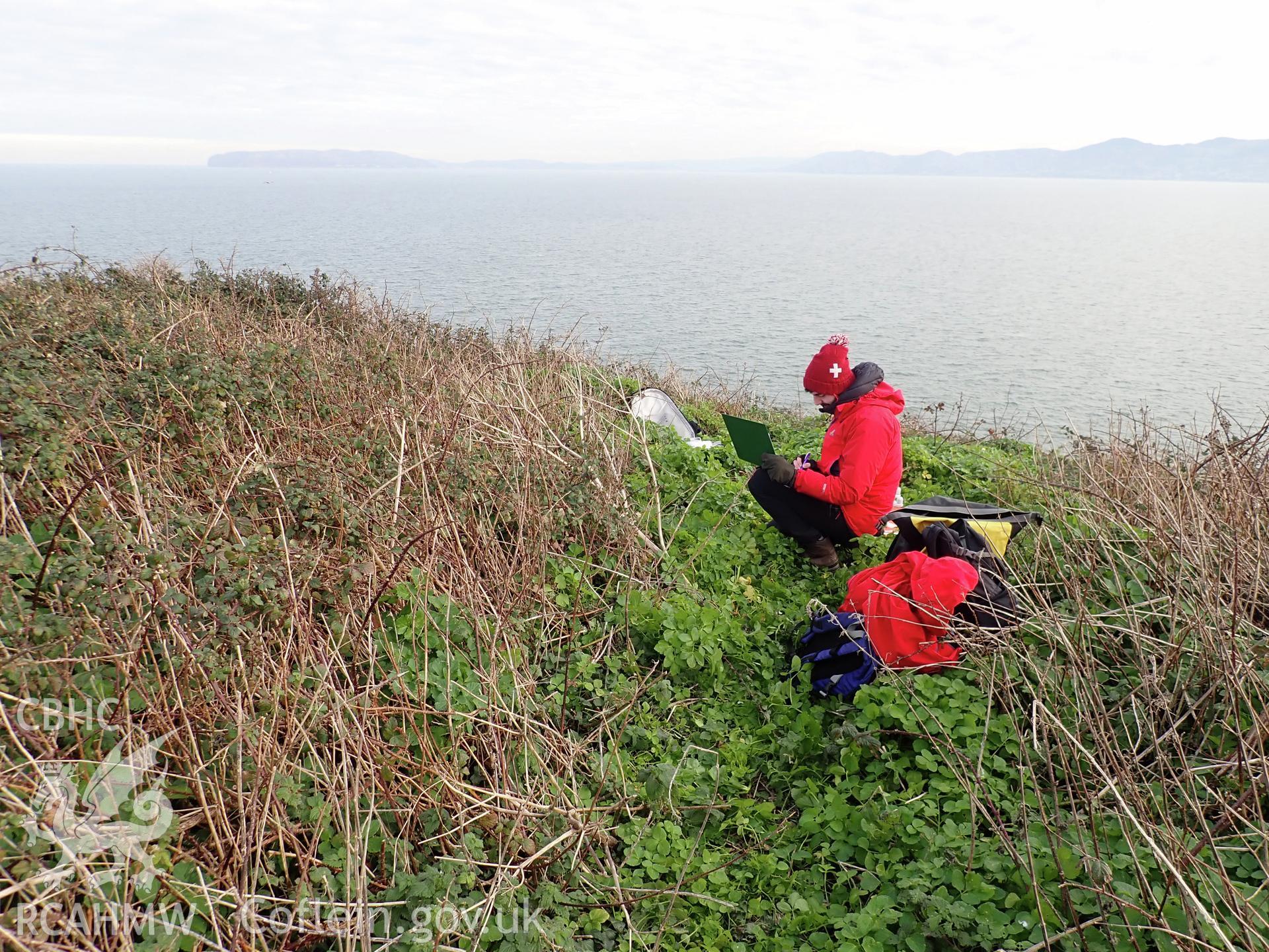 Drone/UAV survey in progress by Dan Hunt on the church on Puffin Island or Ynys Seiriol, 26 November 2018 for the CHERISH Project. ? Crown: CHERISH PROJECT 2018. Produced with EU funds through the Ireland Wales Co-operation Programme 2014-2020. All material made freely available through the Open Government Licence.