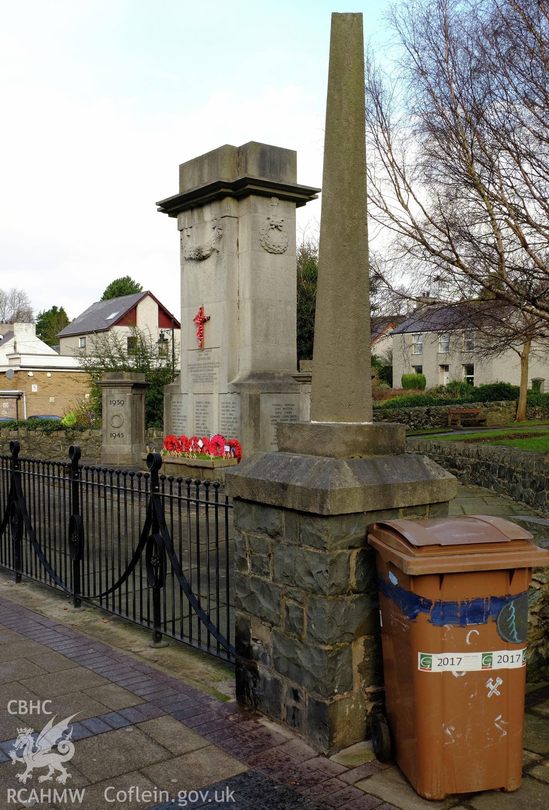 Colour photograph showing a view of Bethesda War Memorial's pier, obelisk and forecourt railings, produced by Richard Hayman 16th February 2017