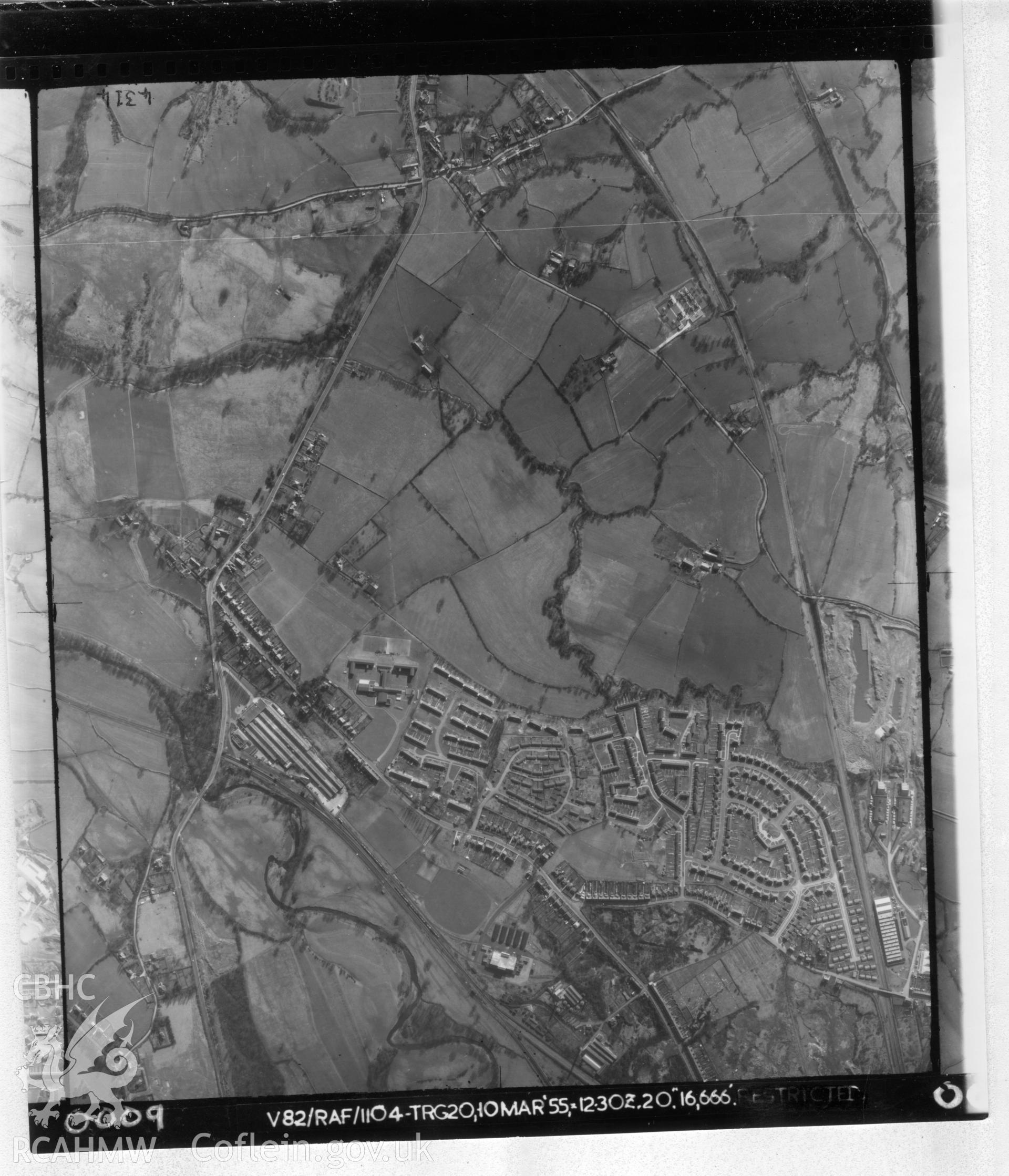 Aerial photograph of Cwmbran, taken on 10th March 1955. Included as part of Archaeology Wales' desk based assessment of former Llantarnam Community Primary School, Croeswen, Oakfield, Cwmbran, conducted in 2017.