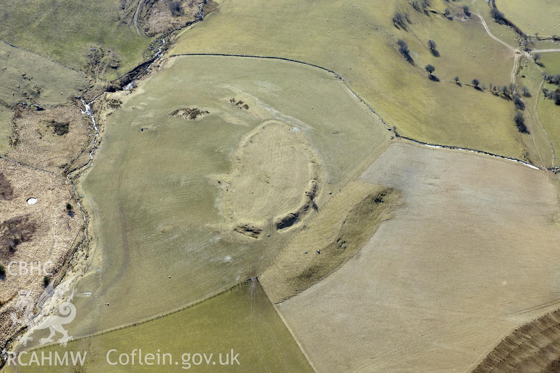 Pen y Castell hillfort, Salem, north east of Aberystwyth. Oblique aerial photograph taken during the Royal Commission's programme of archaeological aerial reconnaissance by Toby Driver on 2nd April 2013.