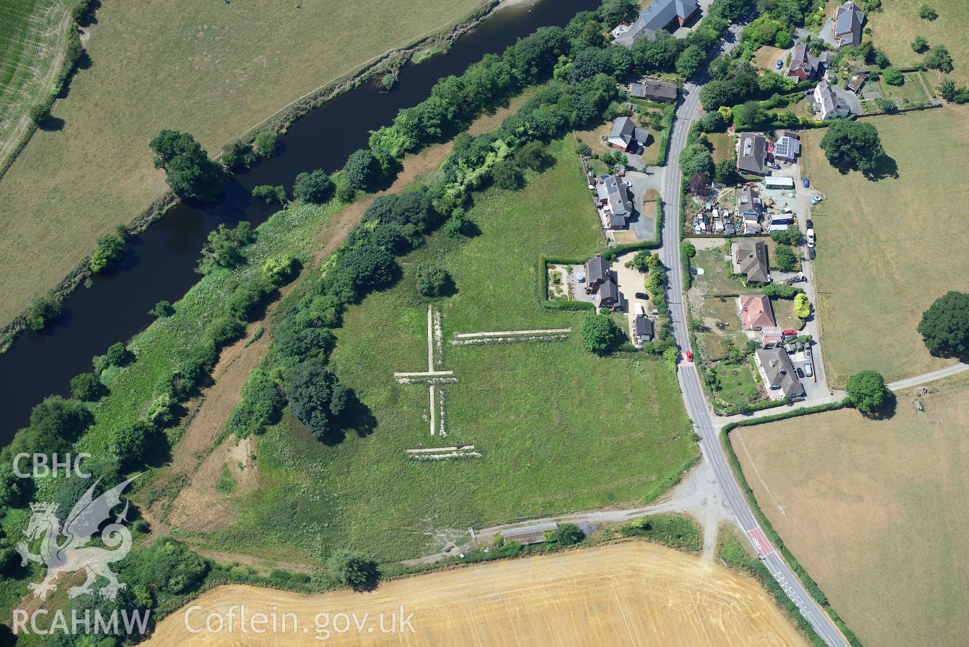 Royal Commission aerial photography of an archaeological evaluation by Trysor at SJ 230 205 in Llansanffraid ym mechain village, taken on 19th July 2018 during the 2018 drought.