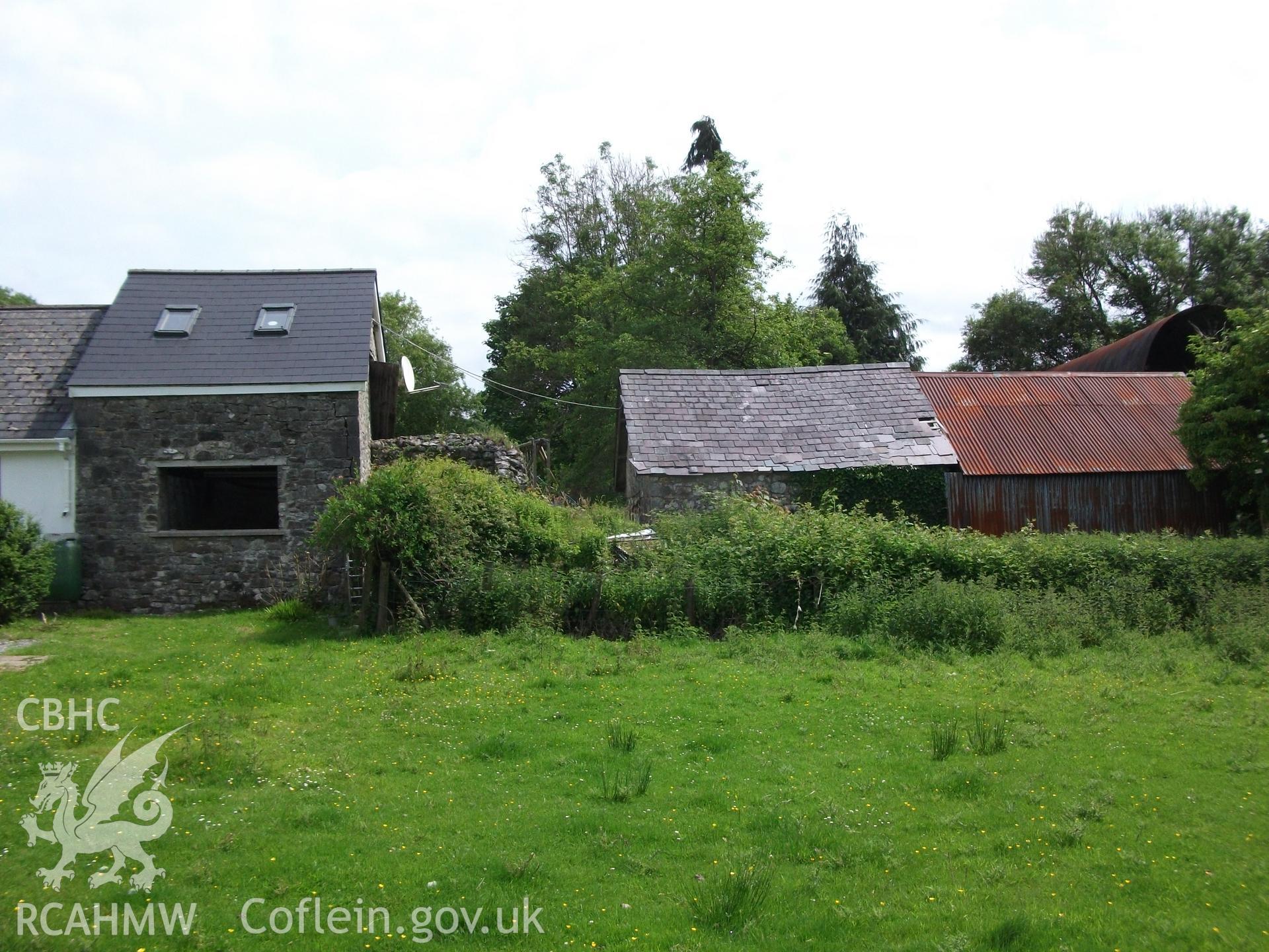 Photograph showing rear of building attached to the cottage and rear of building adjacent to the cottage at Pant-y-Castell, Maesybont. Photographed by Mark Waghorn to meet a condition attached to planning application.