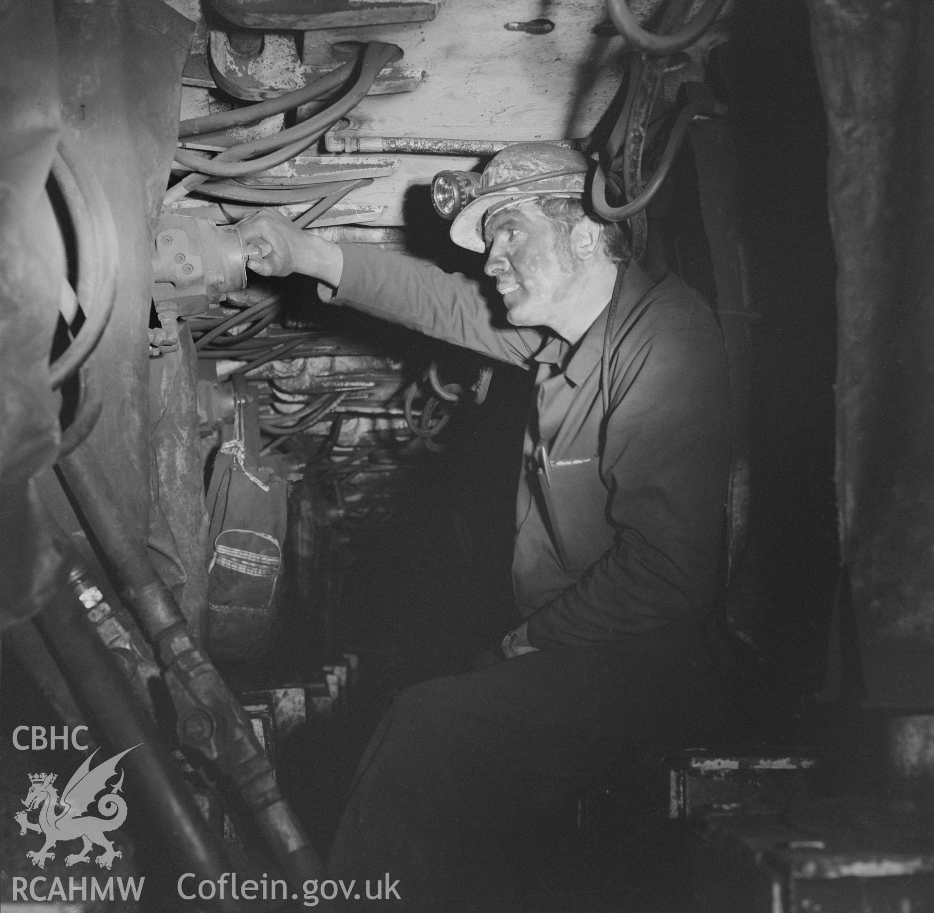 Digital copy of an acetate negative showing chocksman on coal face T Taff Colliery, from the John Cornwell Collection.
