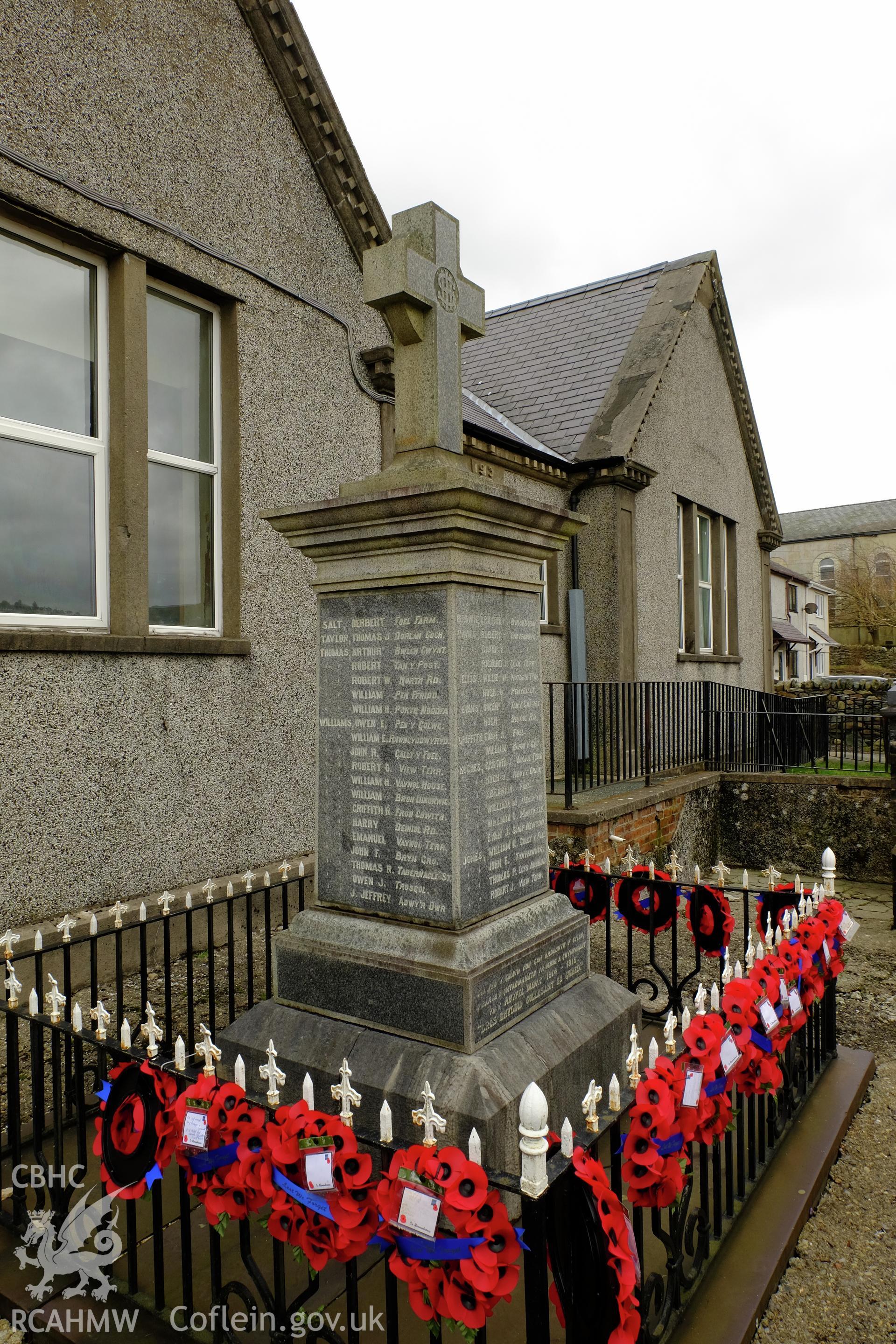 Colour photograph showing view looking north east at the war memorial outside Carnegie Library, Deiniolen, produced by Richard Hayman 7th March 2017