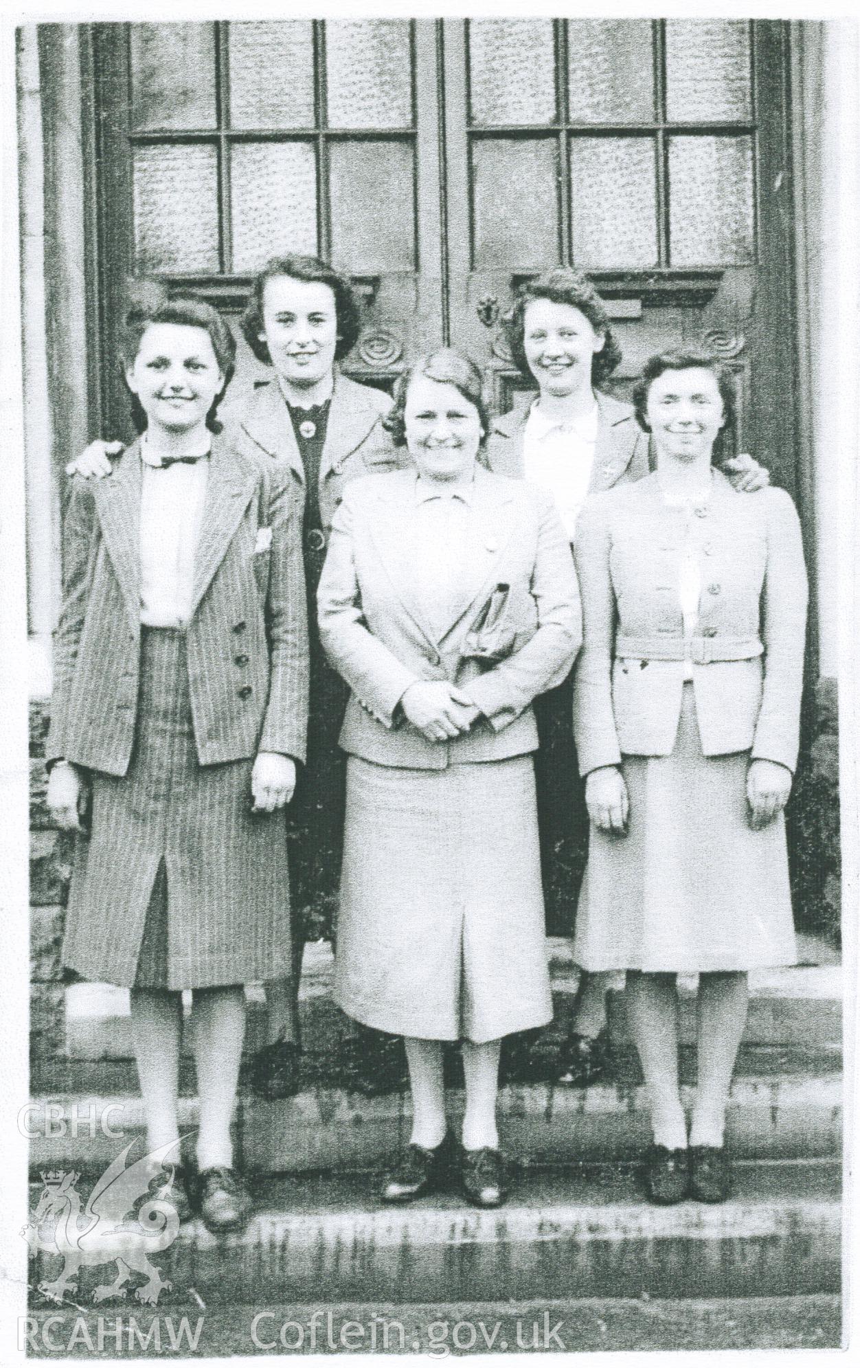Black and white photograph of four girls from Bethania Sunday School with Sunday School teacher Mrs Mini Treharne, circa 1940s. Donated to the RCAHMW by Cyril Philips as part of the Digital Dissent Project.