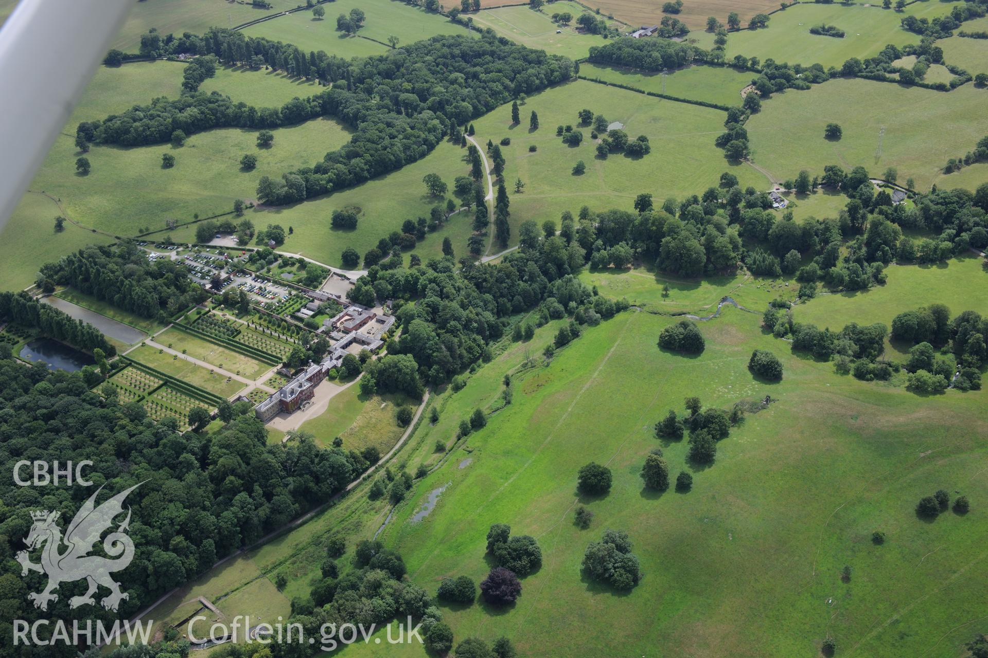 Erddig Hall including garden, stables and gardener's cottage. Oblique aerial photograph taken during the Royal Commission's programme of archaeological aerial reconnaissance by Toby Driver on 30th July 2015.