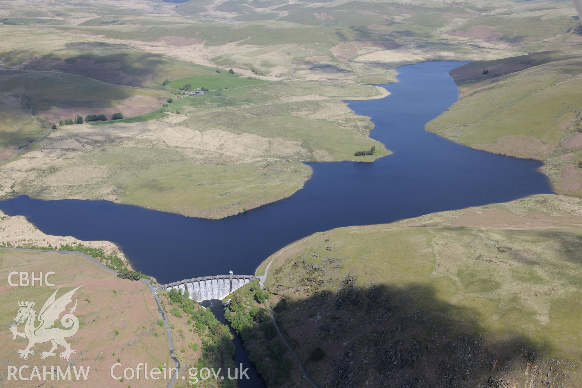 Pen-y-Garreg reservoir, and Craig Goch dam and valve tower. Oblique aerial photograph taken during the Royal Commission's programme of archaeological aerial reconnaissance by Toby Driver on 3rd June 2015.