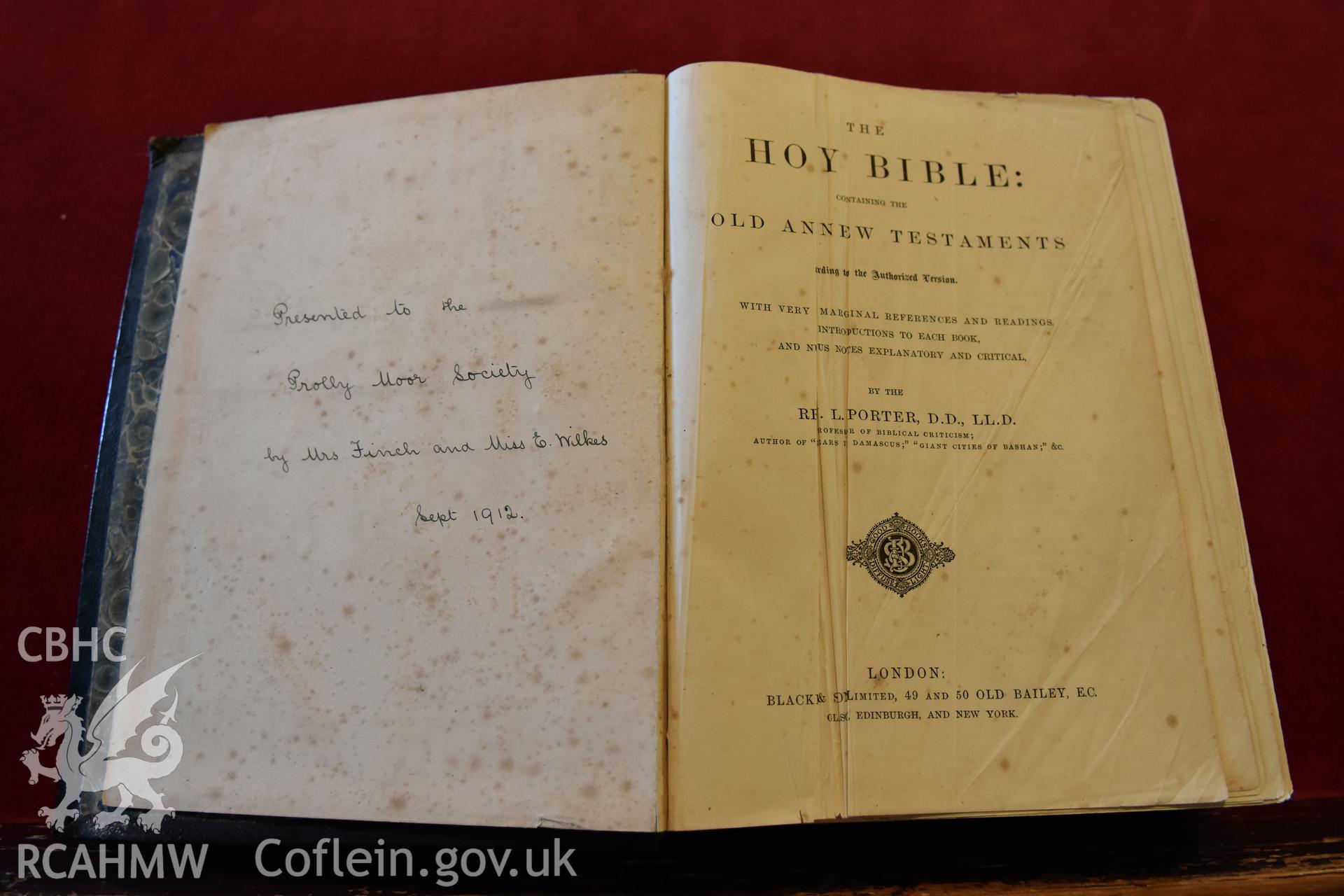 Frontispiece of older bible at Hyssington Primitive Methodist Chapel. Handwriting reads 'Presented to the/ Prolly Moor Society/ by Mrs Finch and Miss E. Wilkes/ Sept 1912. Photographic survey conducted by Sue Fielding on 7th December 2018.
