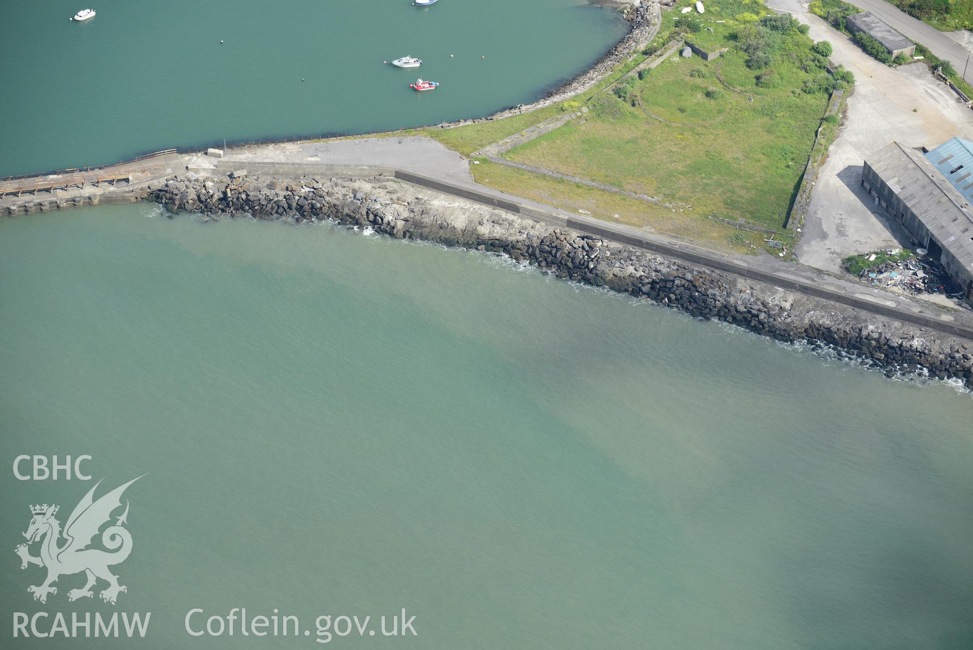 Boat repair and recycling workshop at Swansea Docks. Oblique aerial photograph taken during the Royal Commission's programme of archaeological aerial reconnaissance by Toby Driver on 19th June 2015.