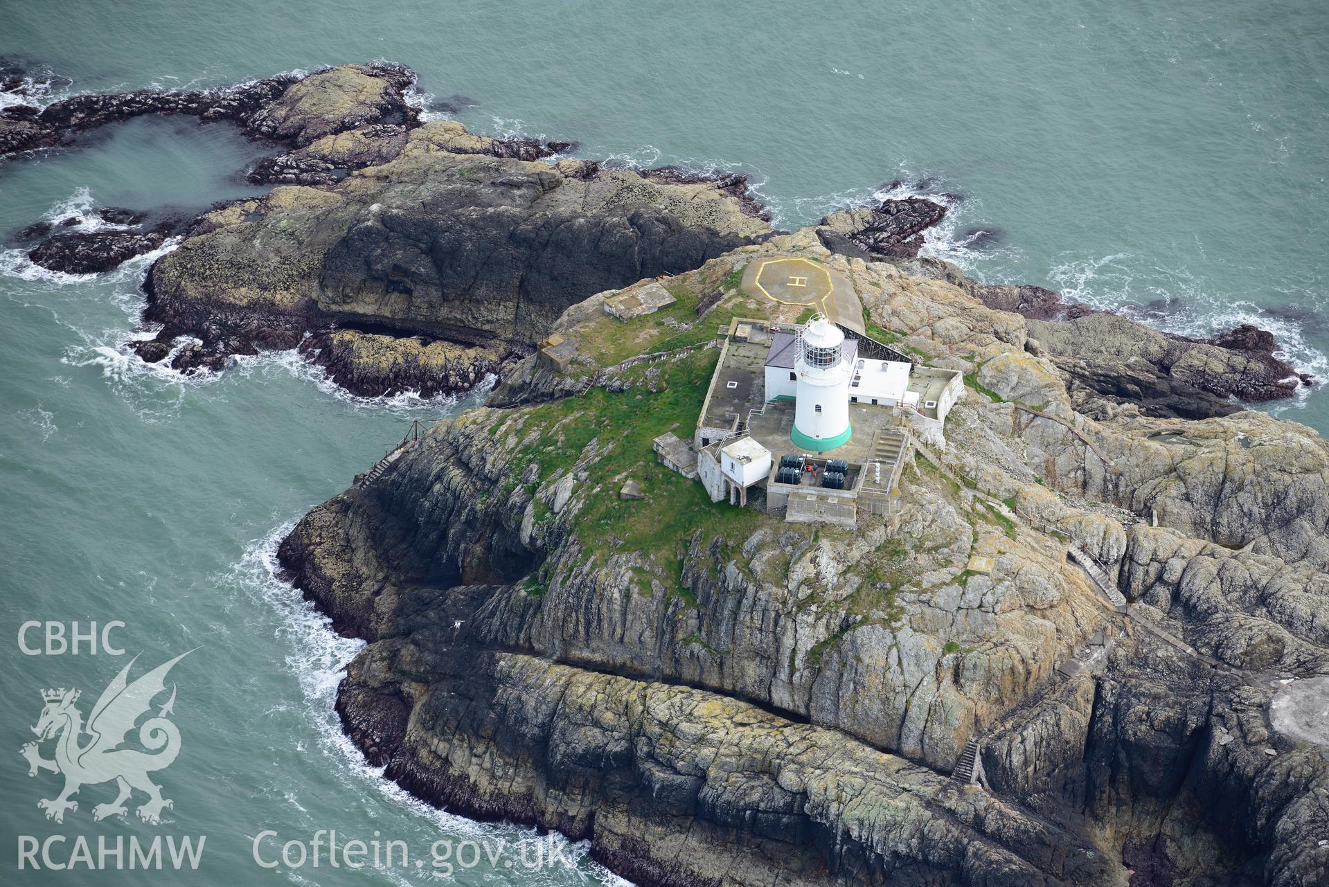 South Bishop Lighthouse at extreme low tide. Baseline aerial reconnaissance survey for the CHERISH Project. ? Crown: CHERISH PROJECT 2017. Produced with EU funds through the Ireland Wales Co-operation Programme 2014-2020. All material made freely available through the Open Government Licence.