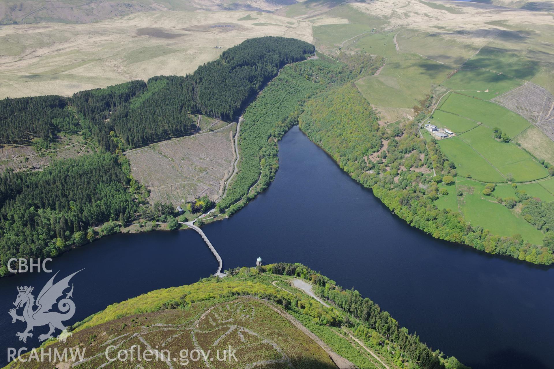 Garreg-Ddu dam, reservoir and valve tower, Caban Coch reservoir and Nantgwyllt Church at Elan Valley. Oblique aerial photograph taken during the Royal Commission's programme of archaeological aerial reconnaissance by Toby Driver on 3rd June 2015.