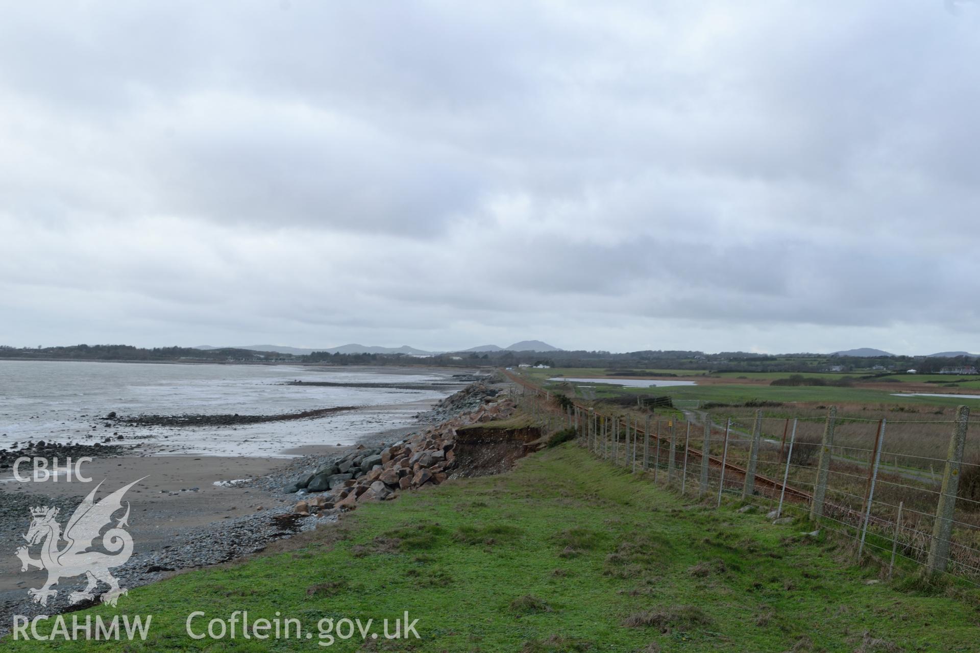View along coast of Cardigan Bay and railway line near Tomen Fawr, Llanystumdwy. Photographed by Gwynedd Archaeological Trust during impact assessment of the site on 20th December 2018. Project no. G2564.