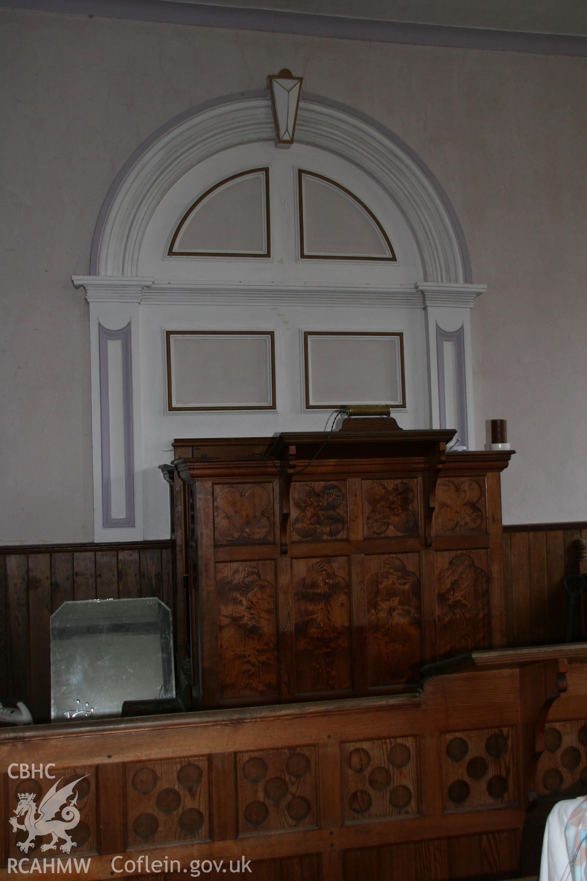 Photograph showing detailed view of the pulpit and rear plaster work at the former Llawrybettws Welsh Calvinistic Methodist chapel, Glanyrafon, Corwen. Produced by Tim Allen on 7th March 2019 to meet a condition attached to planning application.