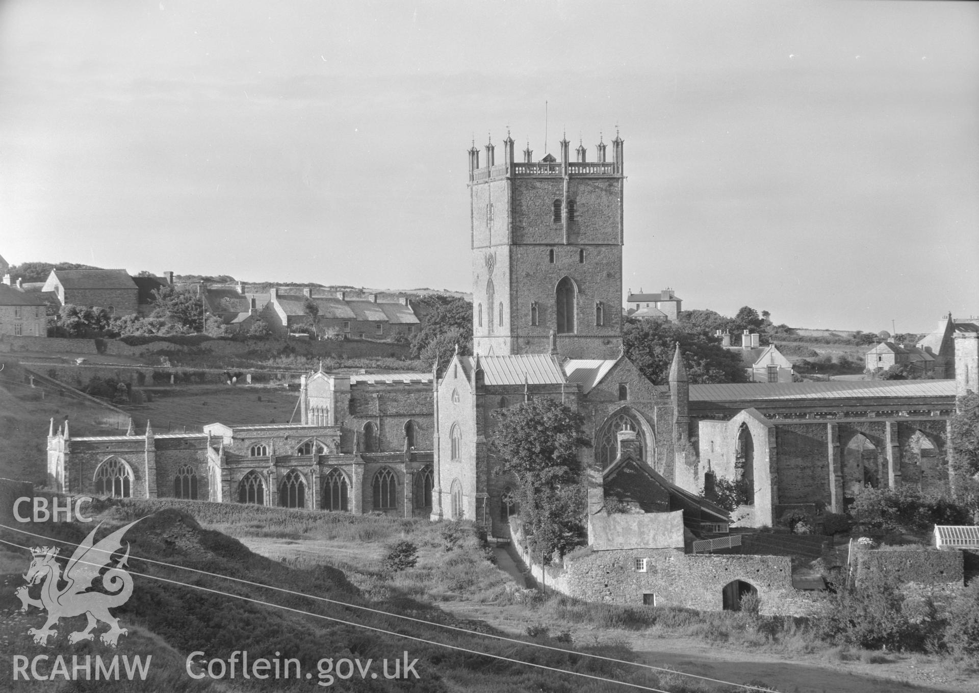 Digital copy of a black and white acetate negative showing general exterior view of St. David's Cathedral, taken by E.W. Lovegrove, July 1936.