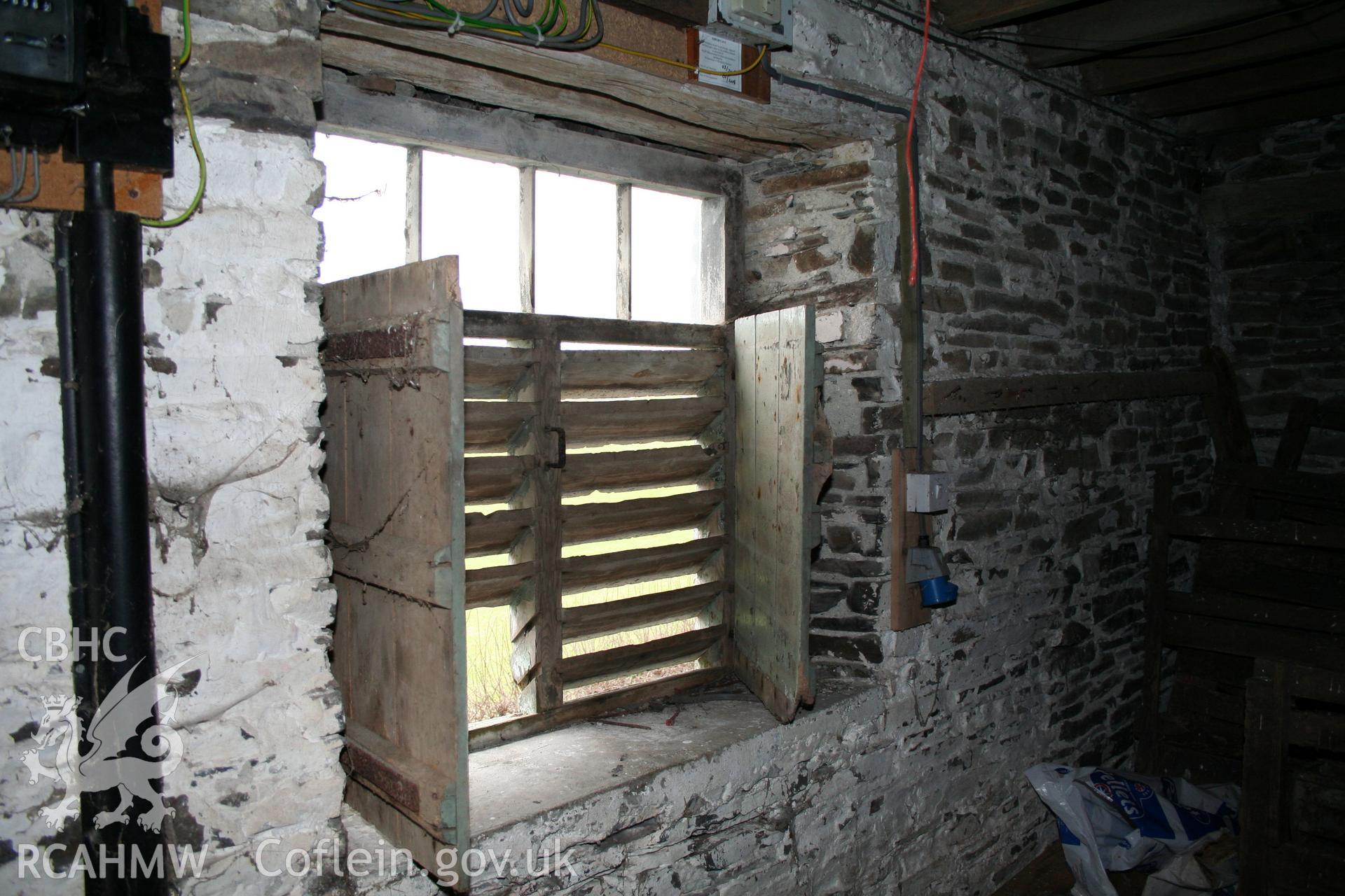 Interior view of wooden grille window shutters. Photographic survey of the threshing house, straw house, mixing house and root house at Tan-y-Graig Farm, Llanfarian, conducted by Geoff Ward and John Wiles, 11th December 2006.