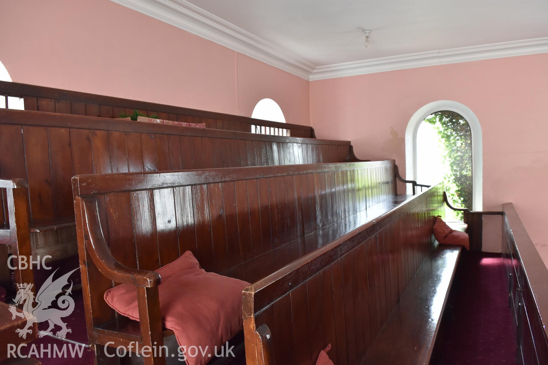 Colour photograph showing detail of wooden pews at the Baptist & Unitarian Chapel, Nottage, Porthcawl. Taken during photographic survey conducted by Sue Fielding on 12th May 2018.