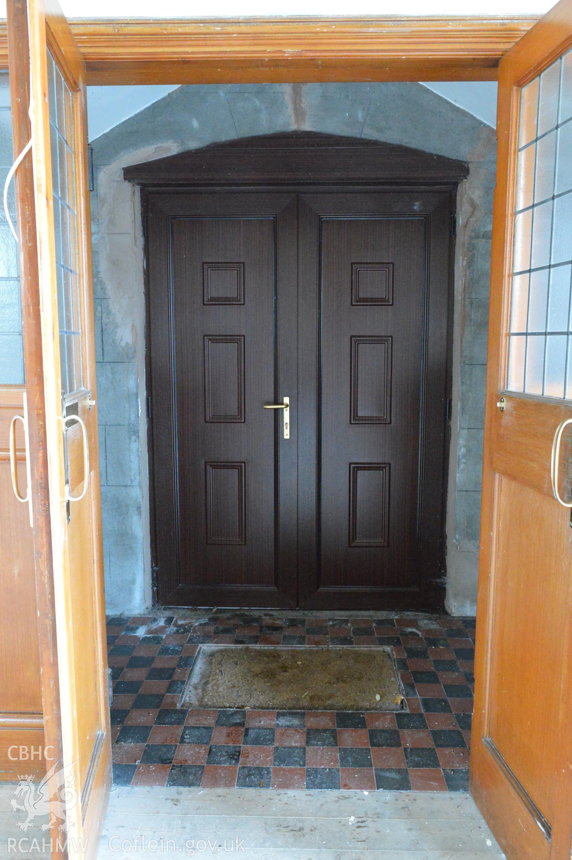 Internal view from the east of main entrance into the church. Digital colour photograph taken during CPAT Project 2396 at the United Reformed Church in Northop. Prepared by Clwyd Powys Archaeological Trust, 2018-2019.