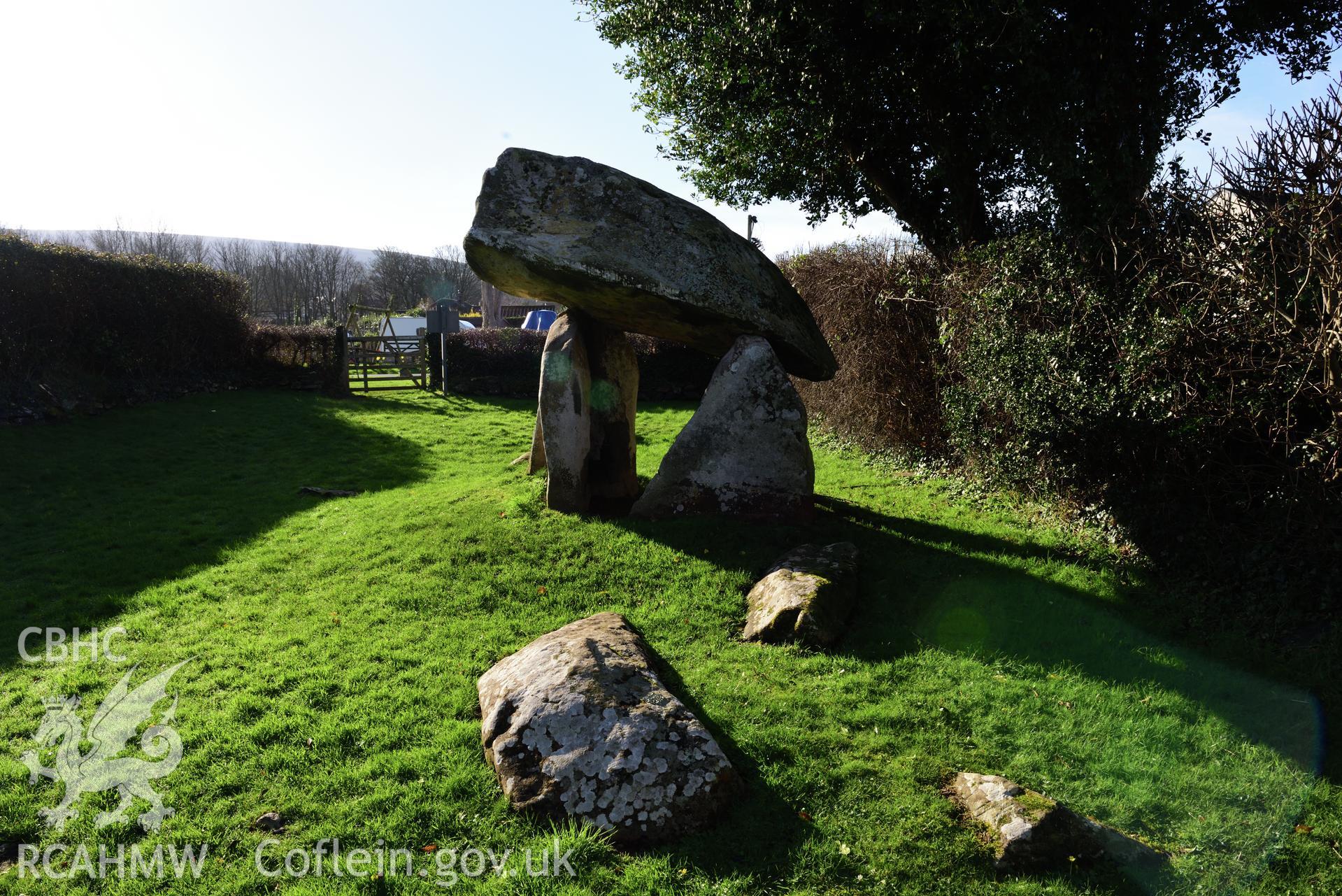 Royal Commission photo survey of Carreg Coetan chambered tomb in winter light, by Toby Driver