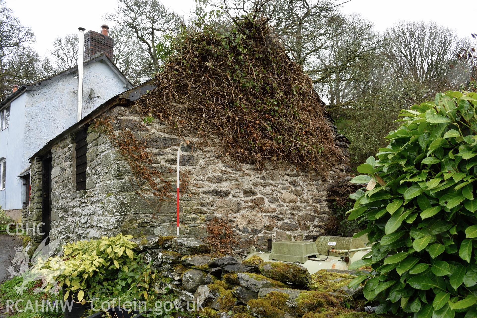 Photograph showing the southern gable of the smithy at Glascoed or Islwyn Smithy, Melin-y-Wig, Denbighshire, by I.P. Brooks of Engineering Archaeological Services Ltd. Taken on 5th April 2019.