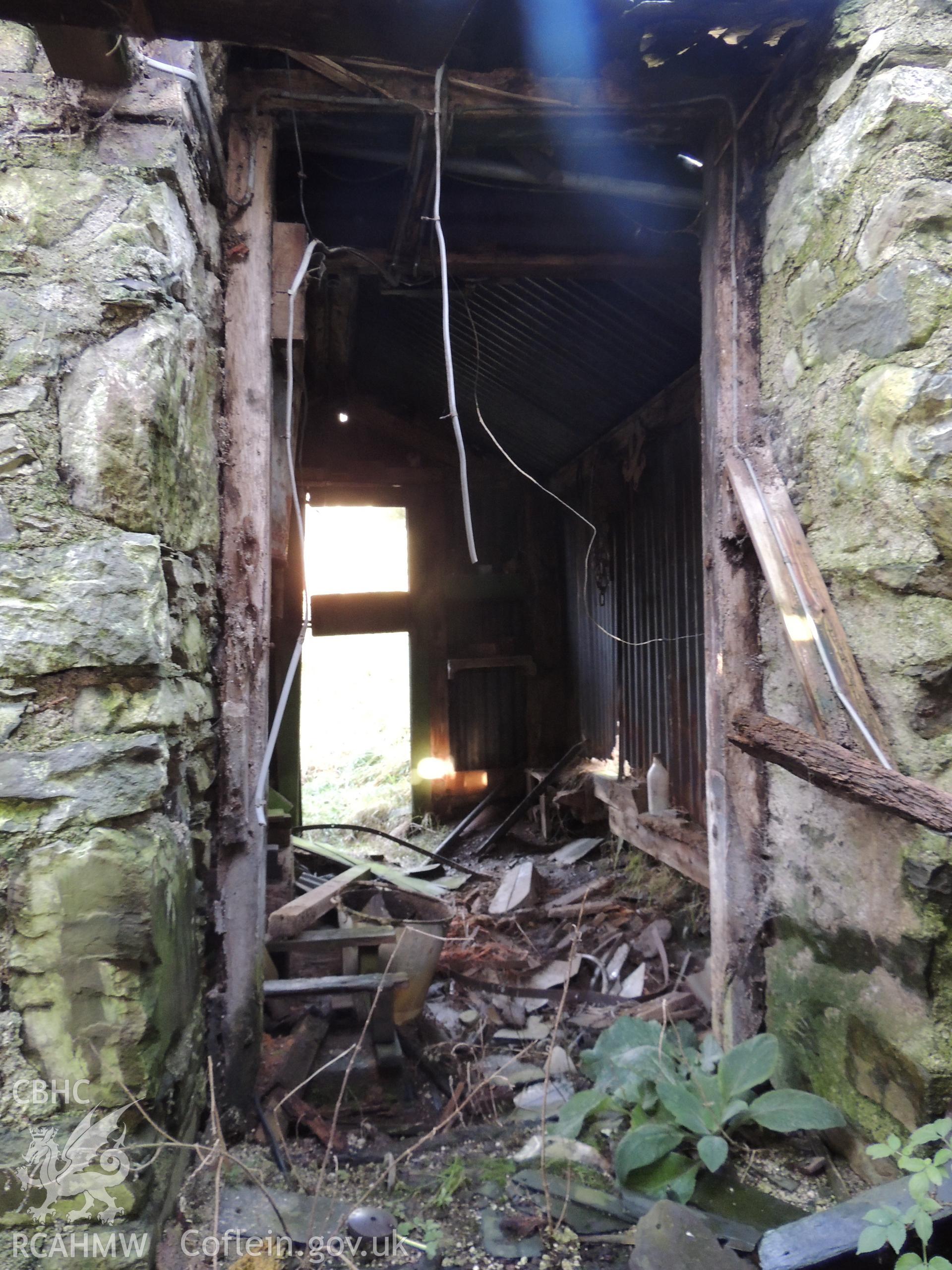 View of lean-on shed, looking north. Photograph taken as part of archaeological building survey conducted at Bryn Gwylan Threshing Barn, Llangernyw, Conwy, carried out by Archaeology Wales, 2017-2018. Report no. 1640. Project no. 2578.