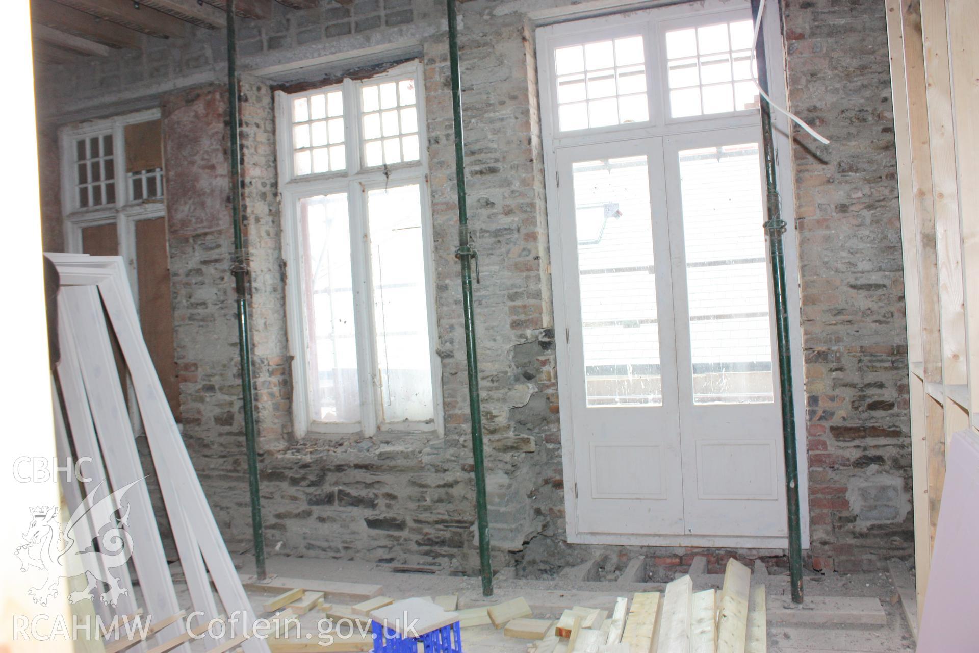 Colour photograph showing interior view of the front club on the first floor at the Old Auction Rooms/ Liberal Club in Aberystwyth. Photographic survey conducted by Geoff Ward on 9th June 2010 during repair work prior to conversion into flats.