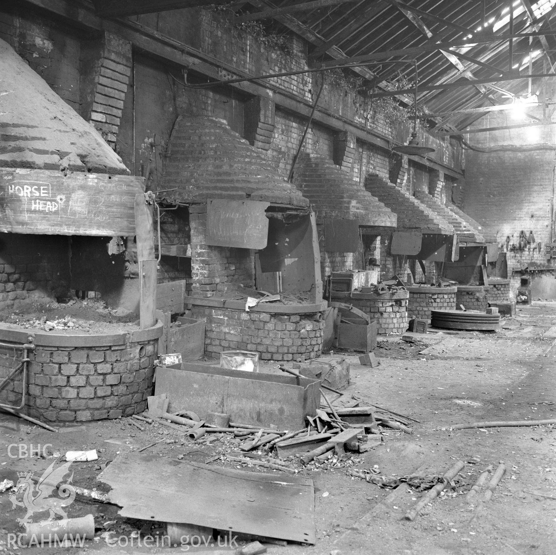 Digital copy of an acetate negative showing interior of blacksmith's shop at South Celynen Colliery, from the John Cornwell Collection.