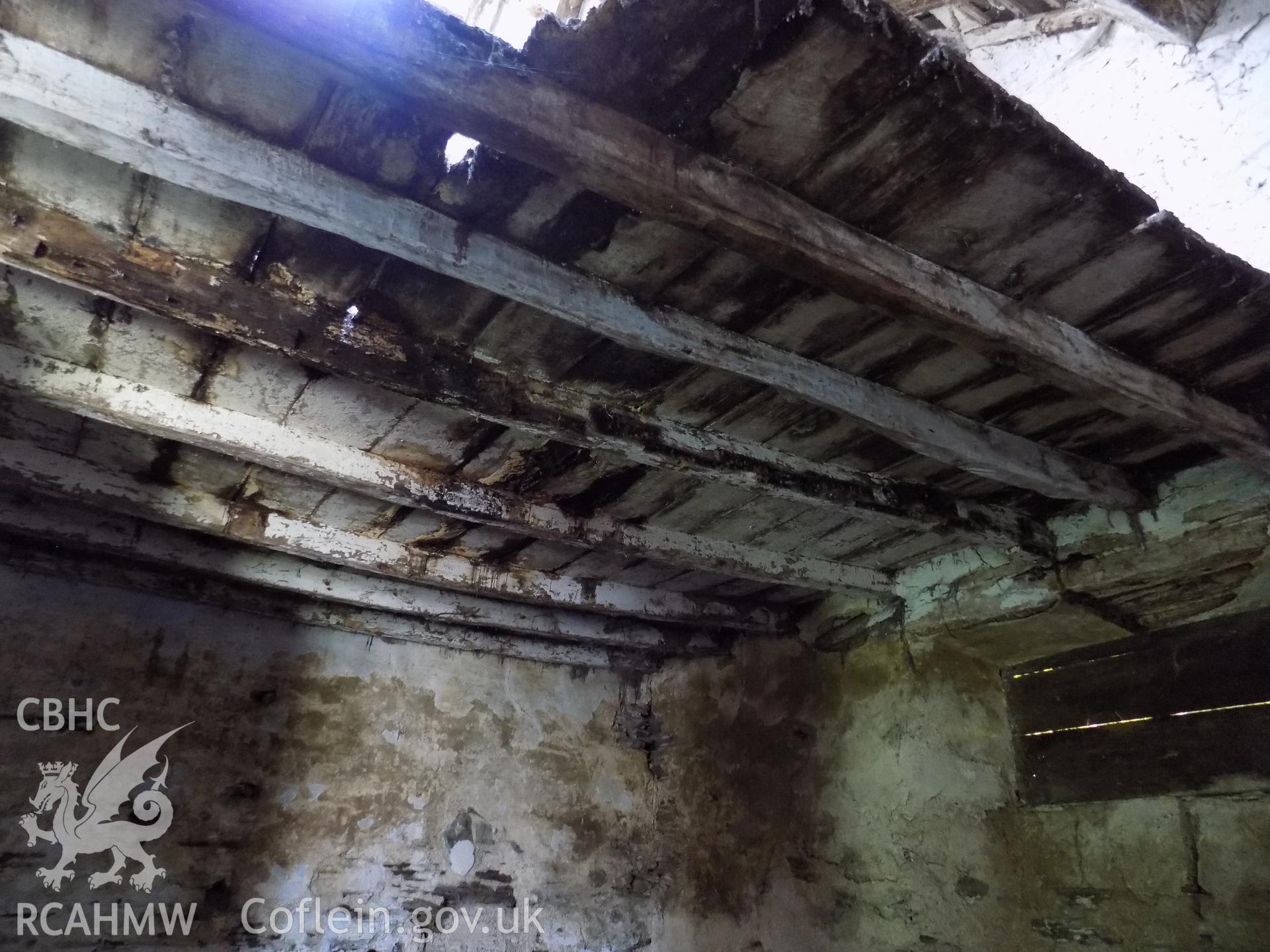 Digital colour photograph showing interior view of remains of ceiling in building attached to Tywyll Nodwydd house, Pennal, dated 2019. Photographed by Mr Gary Coulsby to meet a condition attached to a planning application.