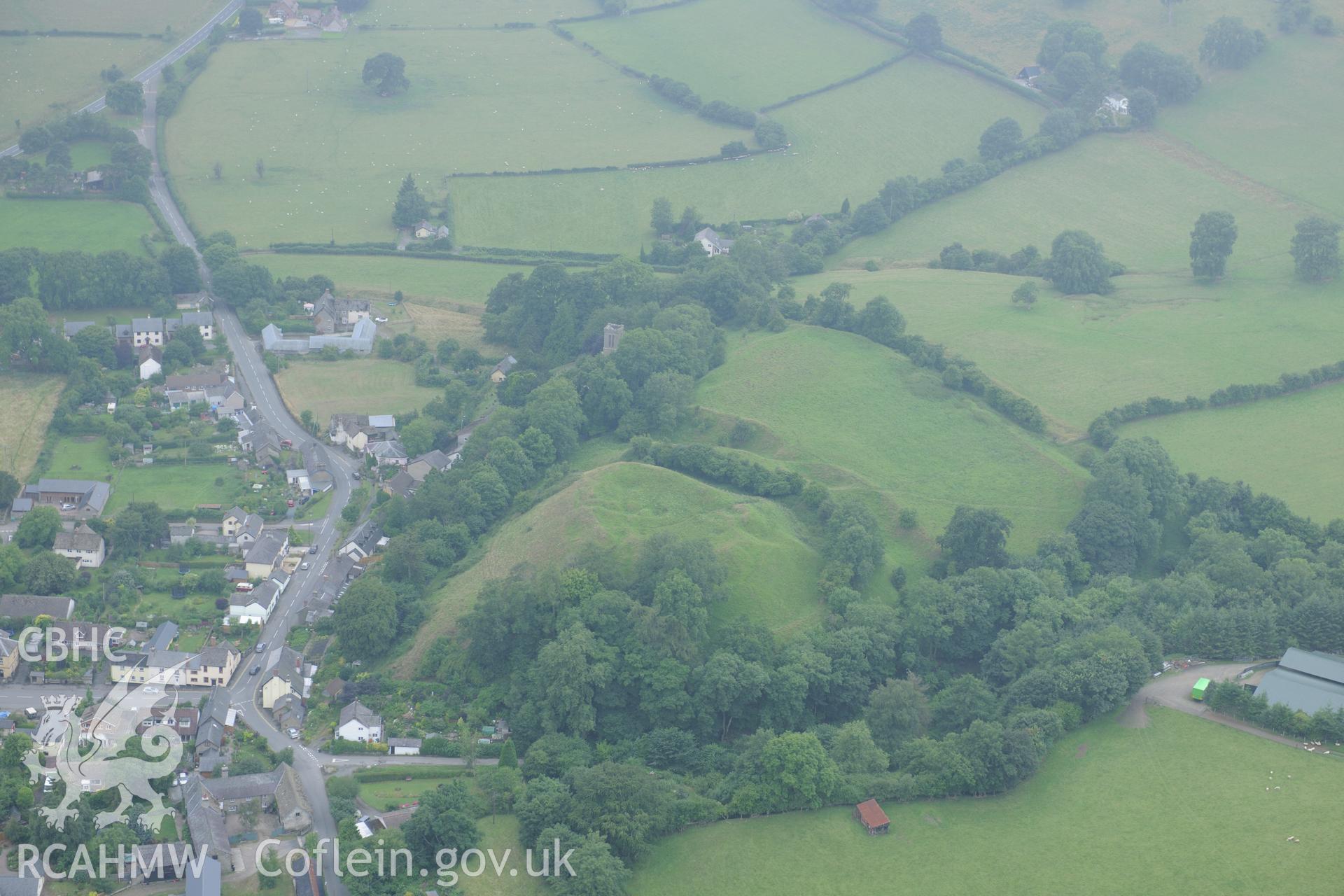 New Radnor Castle, on the north western edge of New Radnor town. Oblique aerial photograph taken during the Royal Commission?s programme of archaeological aerial reconnaissance by Toby Driver on 1st August 2013.