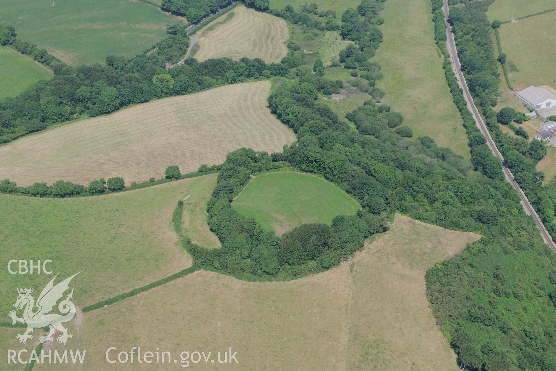 Rudbaxton Rath hillfort. Oblique aerial photograph taken during the Royal Commission?s programme of archaeological aerial reconnaissance by Toby Driver on 16th July 2013.
