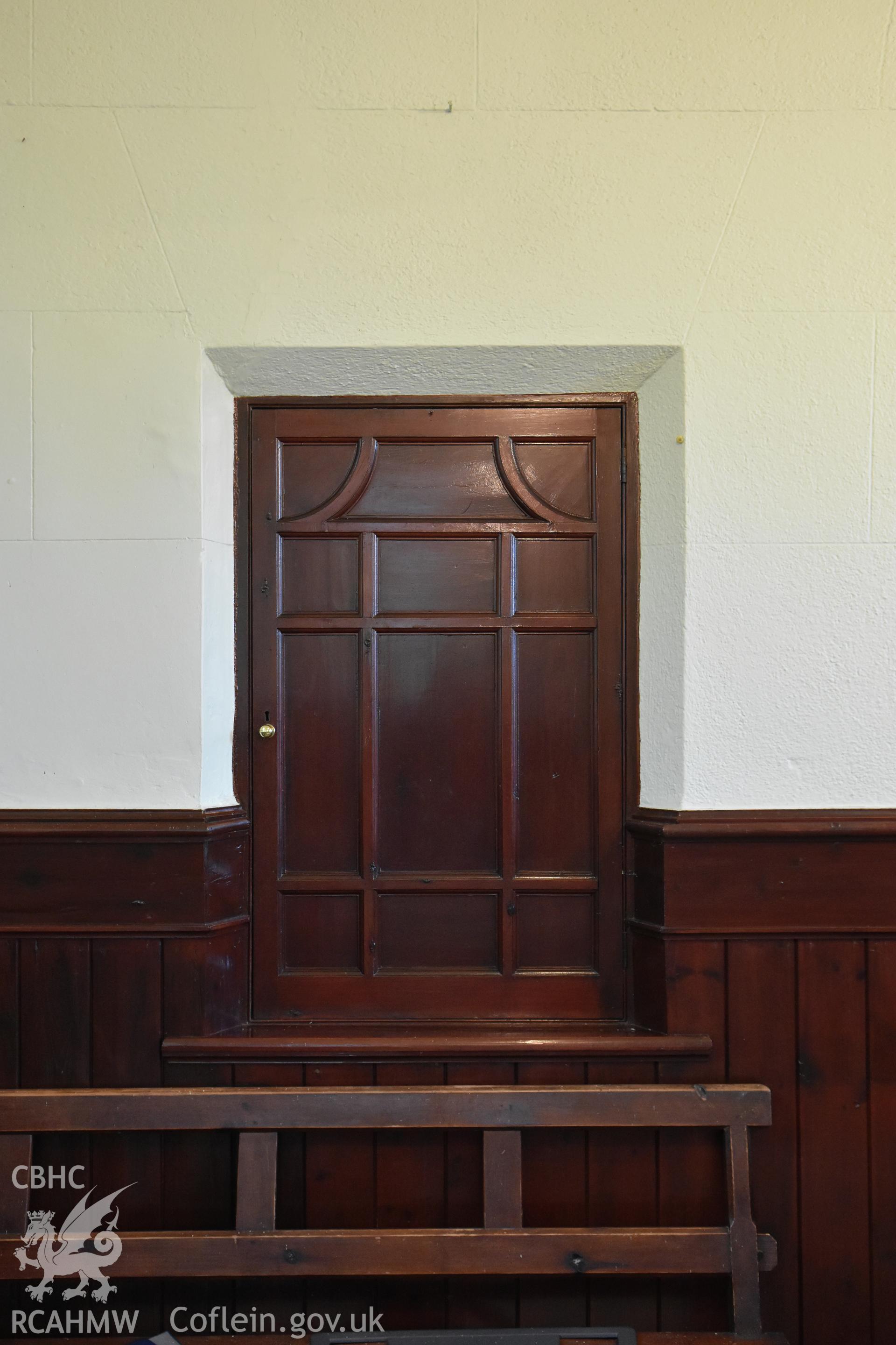 Detailed view of wooden cupboard, bench and panelling at the rear Hyssington Primitive Methodist Chapel, Hyssington, Churchstoke. Photographic survey conducted by Sue Fielding on 7th December 2018.