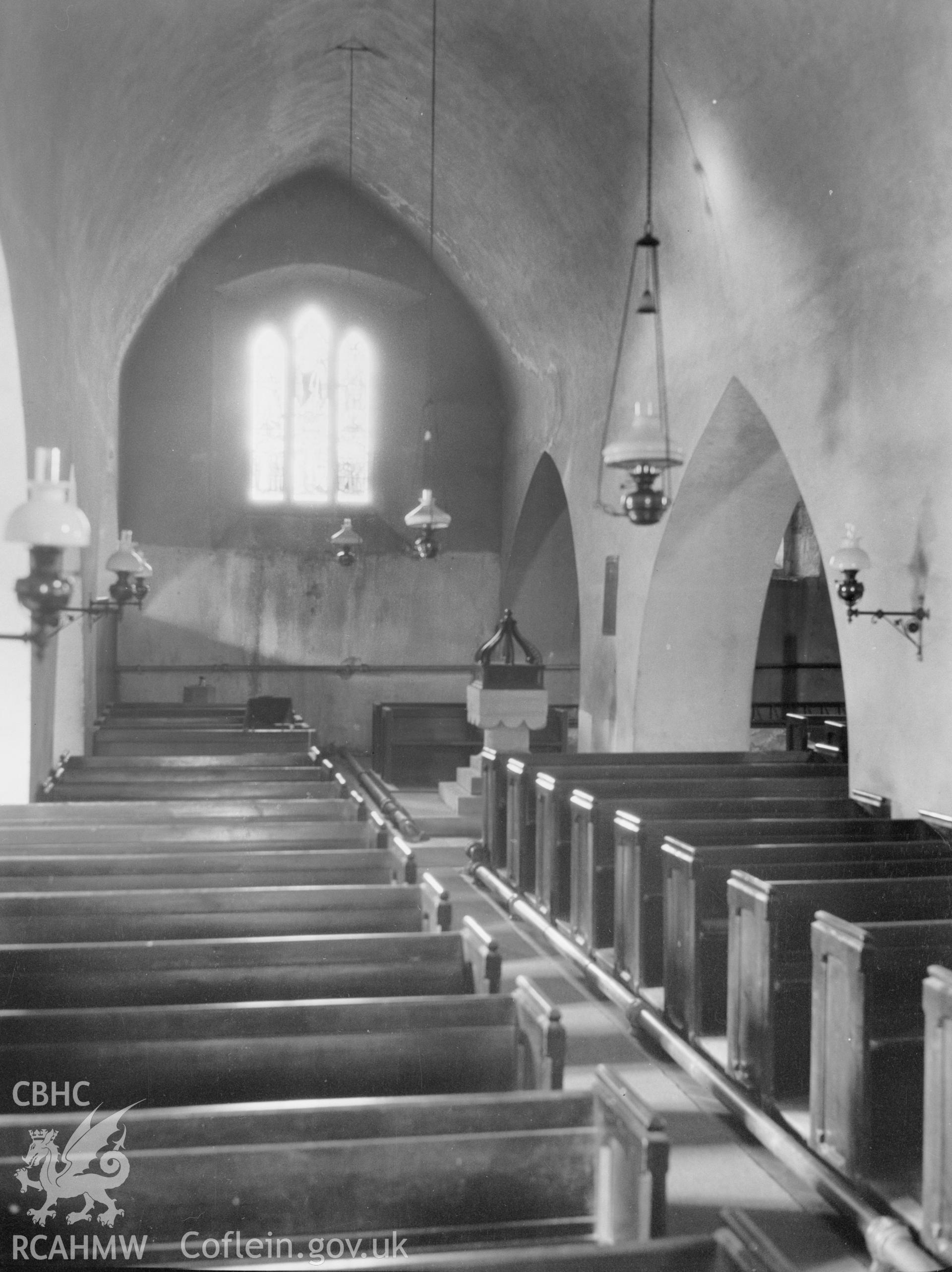 Digital copy of a nitrate negative showing interior view from east, St James's Church,  Manorbier. From the National Building Record Postcard Collection.