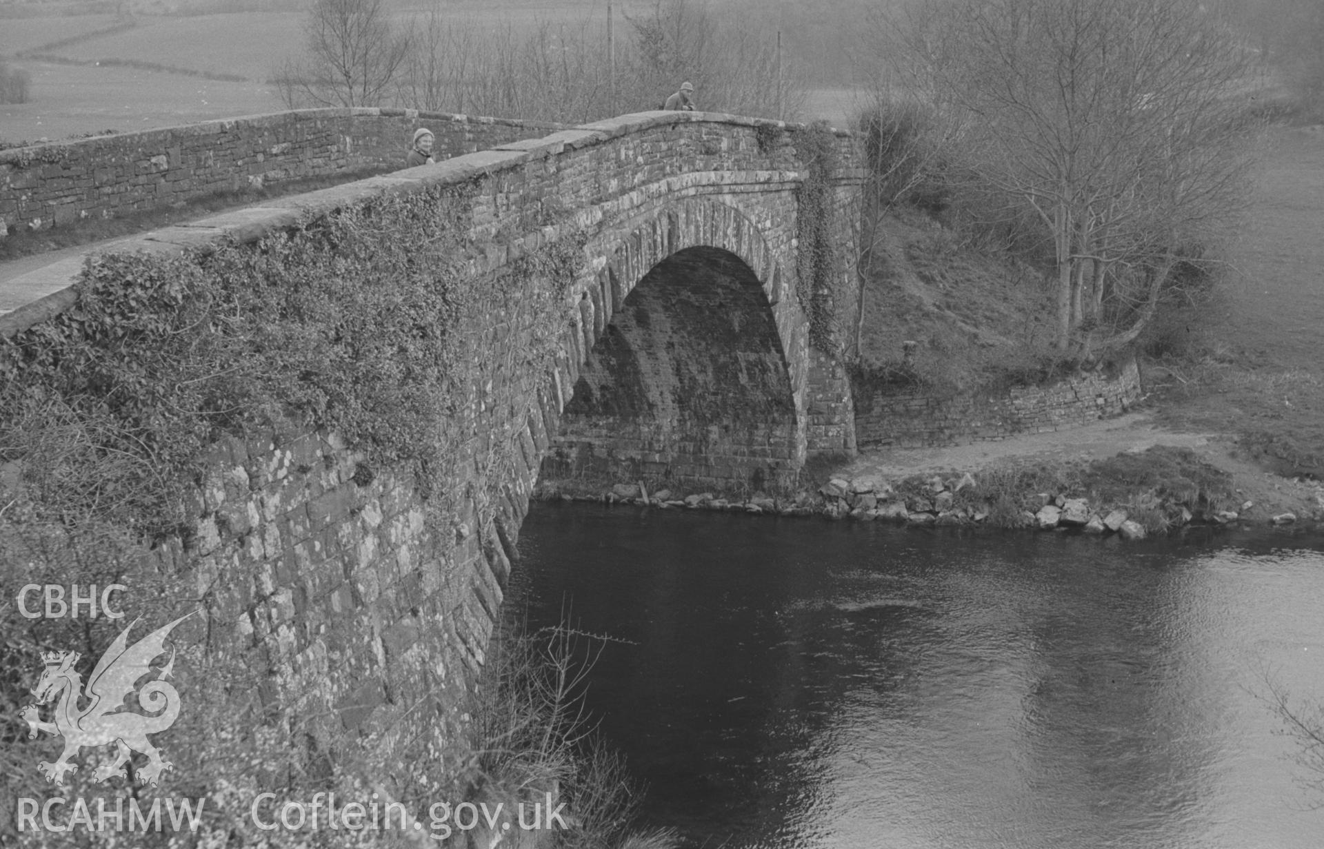 Digital copy of a black and white negative showing Llanfihangel-ar-Arth bridge over the Teifi, looking into Carmarthenshire. Photographed by Arthur O. Chater on 11th April 1967 looking south east from Grid Reference SN 457 403.