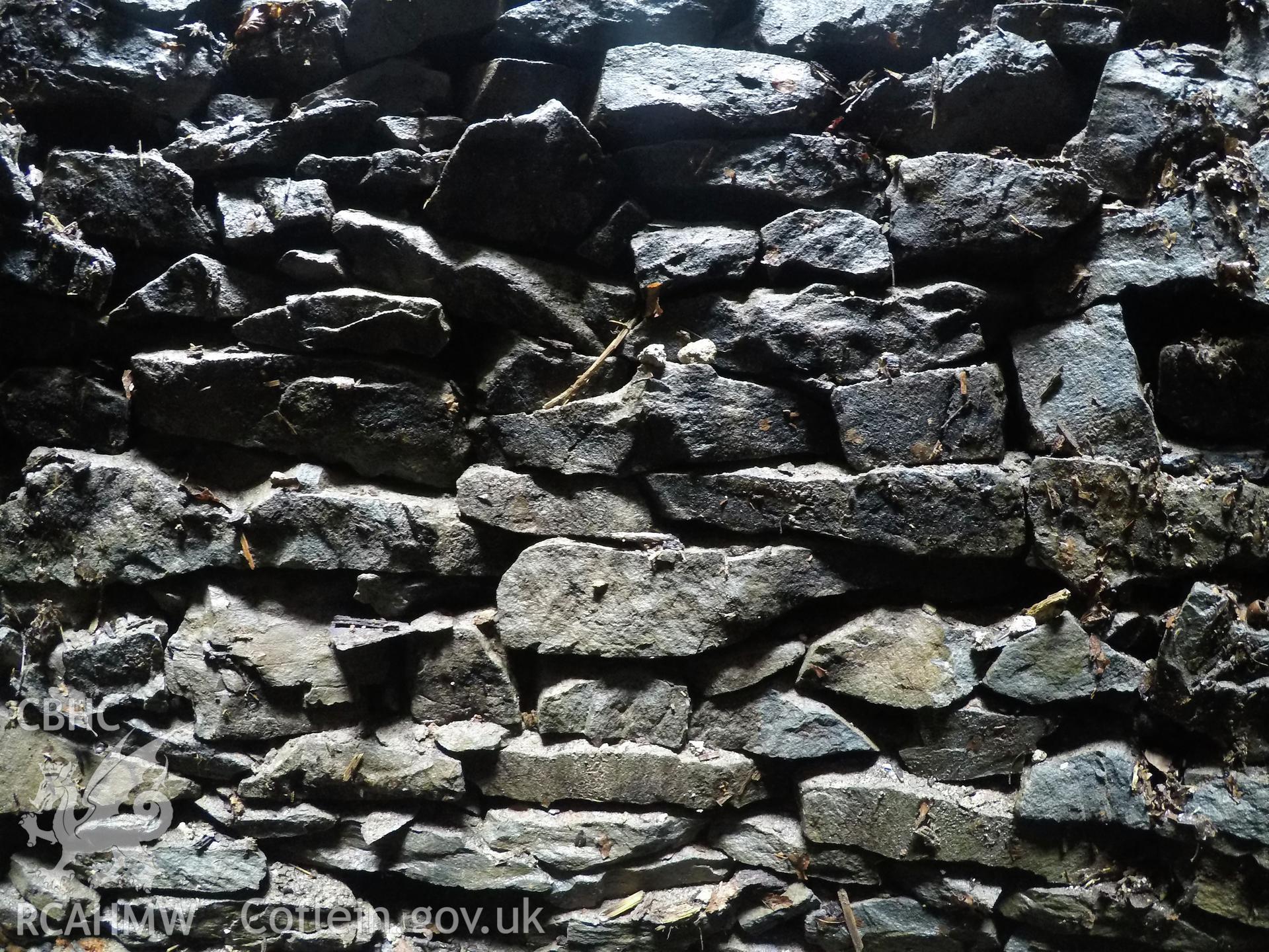 View from the west of well interior at 3.0m depth. Photographed by Gwynedd Archaeological Trust as part of archaeological mitigation report for well at Plas Celynin, Henryd, Conwy, on 1st August 2018. Project no. G2568.