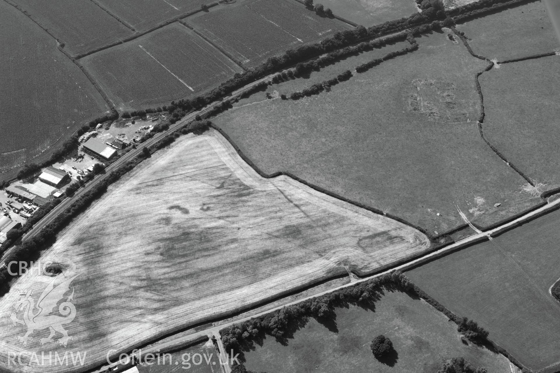 Caermead Roman villa and Morfa Lane cropmark enclosure, Caermead, north west of Llantwit Major. Oblique aerial photograph taken during the Royal Commission?s programme of archaeological aerial reconnaissance by Toby Driver on 1st August 2013.